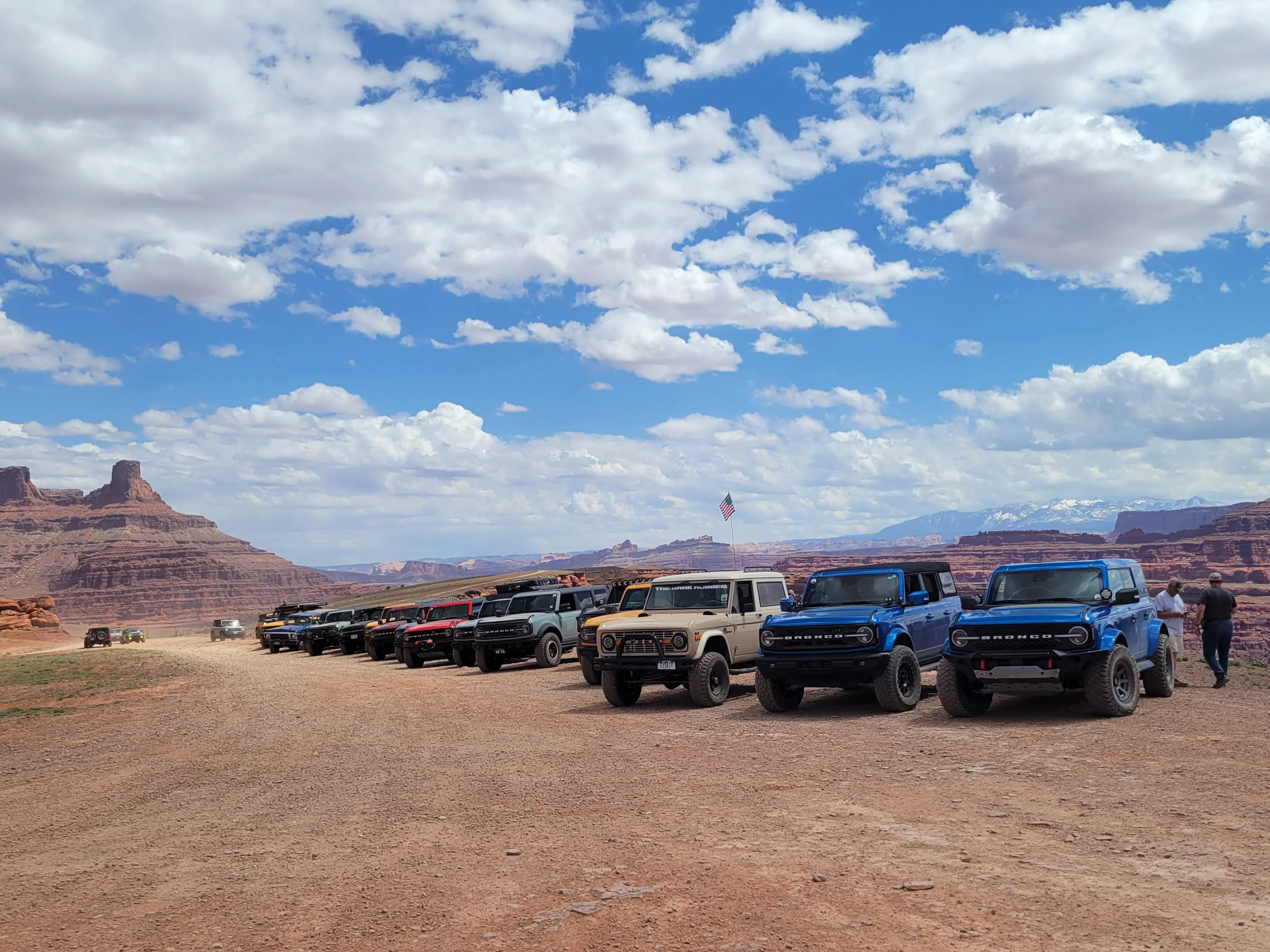 Classic and modern Broncos outfitted with off-road upgrades on red desert terrain in southern Utah