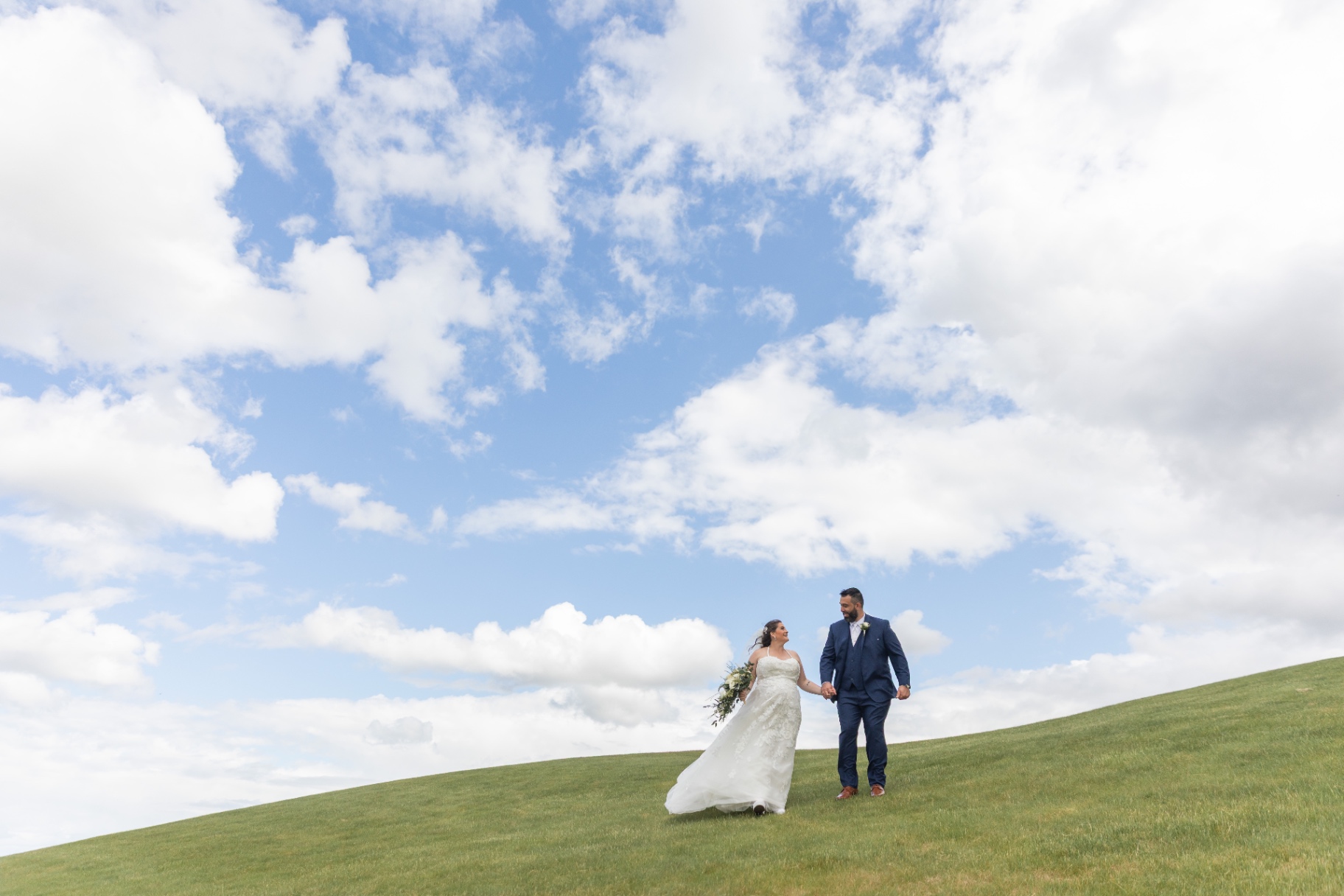 Natalie and Pat—just married—stepping into celebration