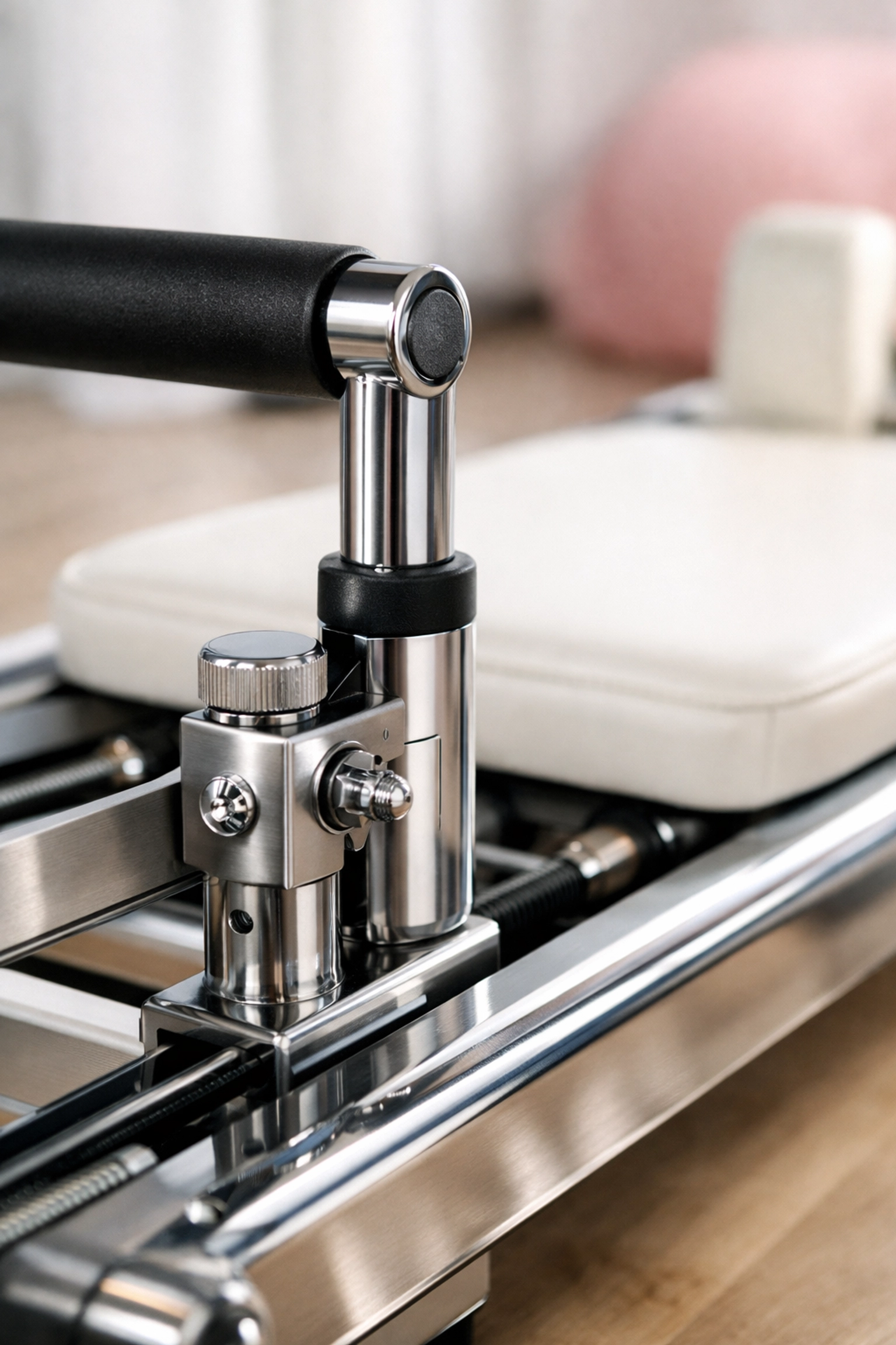 Reformer Pilates machine footbar and carriage rails at Teaser 2 Studio