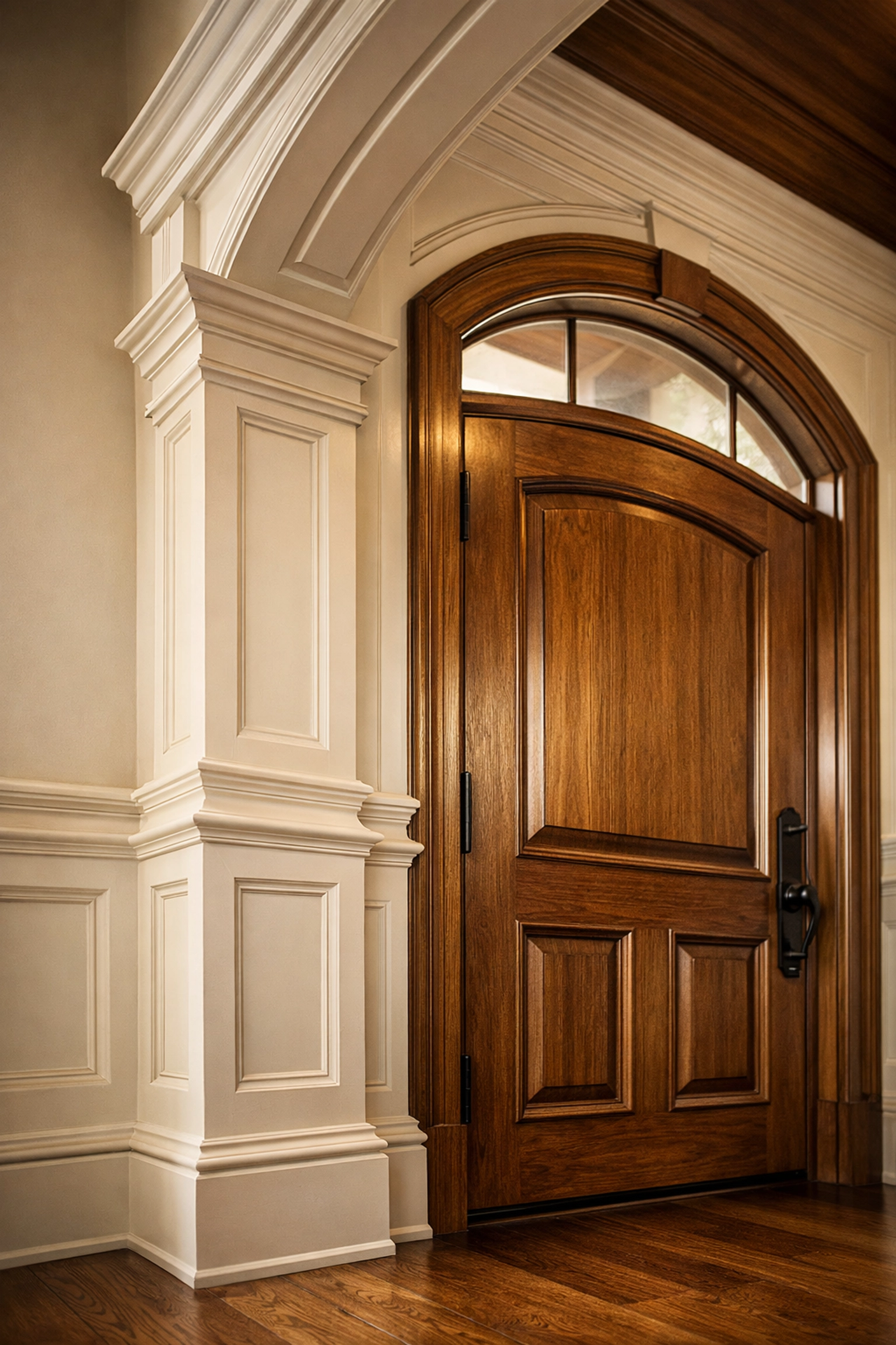 Custom-milled wainscoting and solid wood entryway showing the expert craftsmanship of a Columbia SC Master Builder.