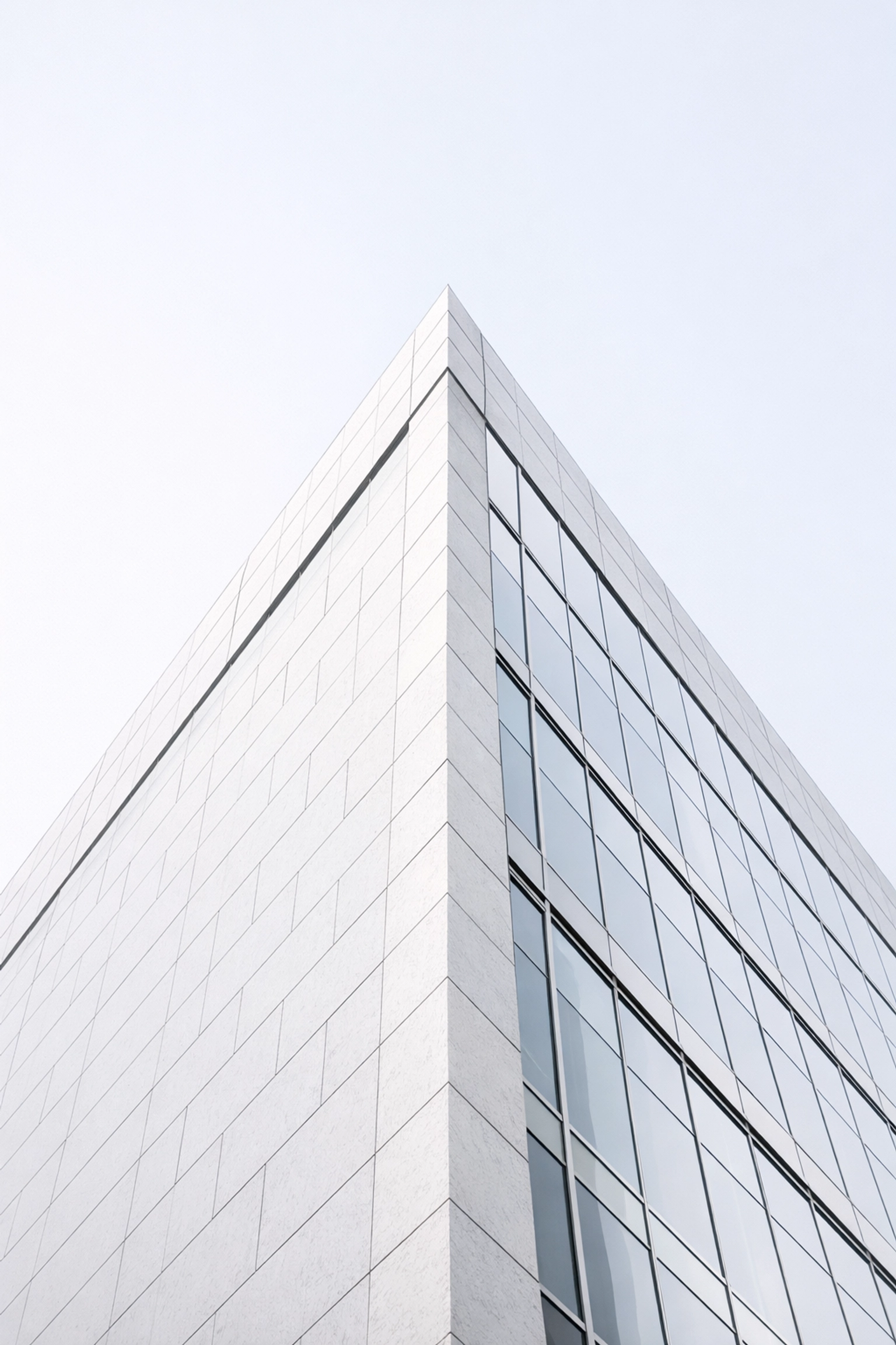 Sleek skyscraper architecture representing structured business growth and a scalable revenue operations model.