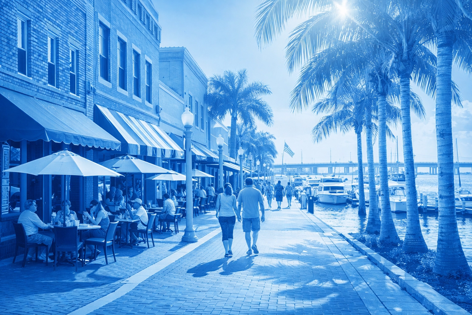 Downtown Fort Myers River District with historic buildings, outdoor cafés, and riverfront walkability