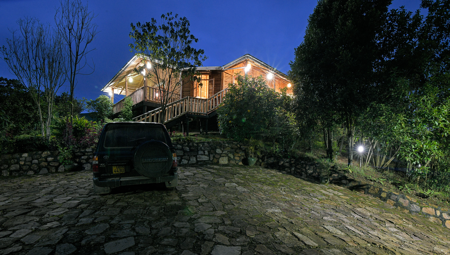 Gorilla Trekking Uganda lodge stay: Orugano Bwindi Lodge main building at night