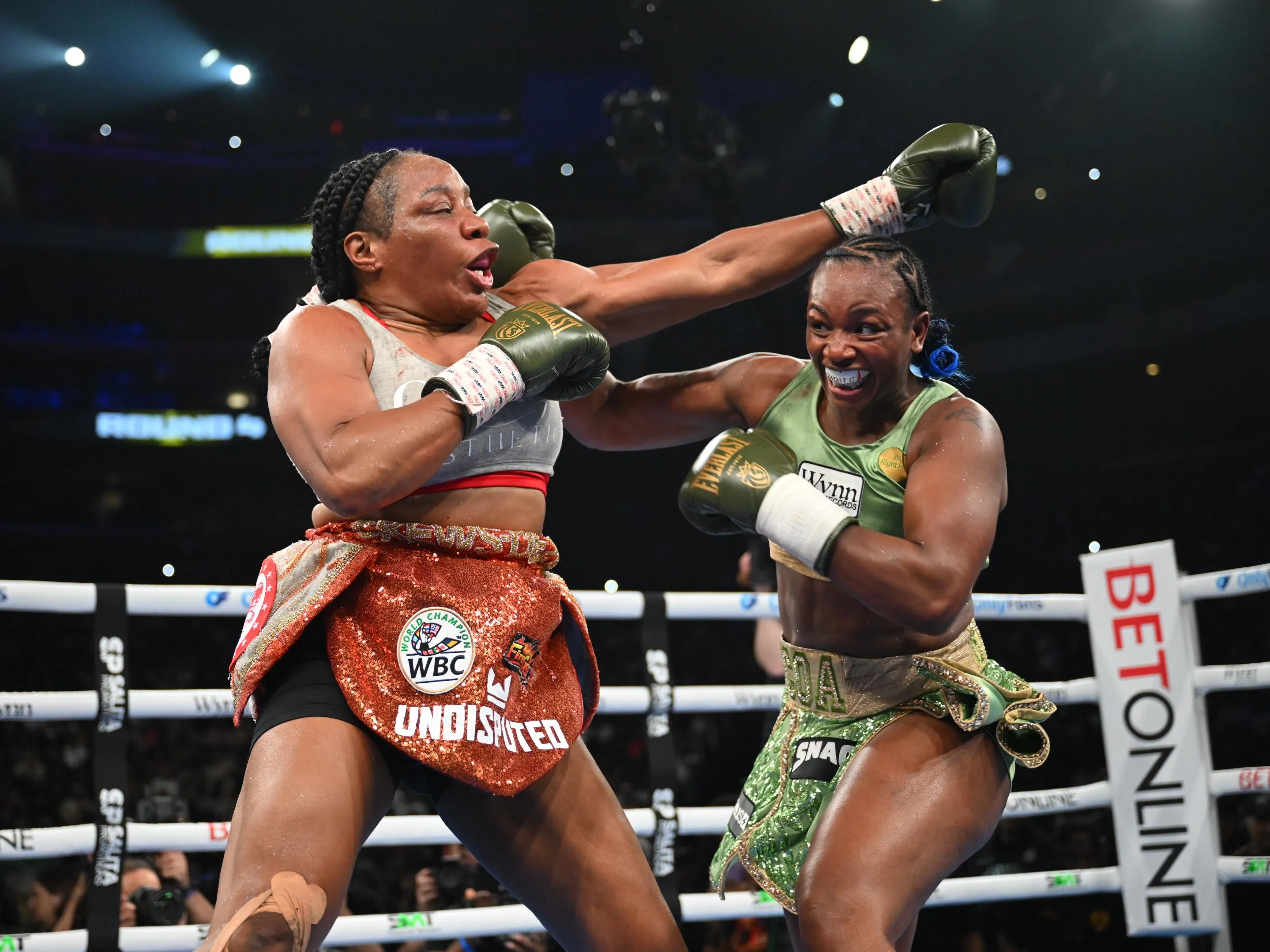Claressa Shields lands a powerful right hook mid-fight as Detroit’s crowd lights up the arena
