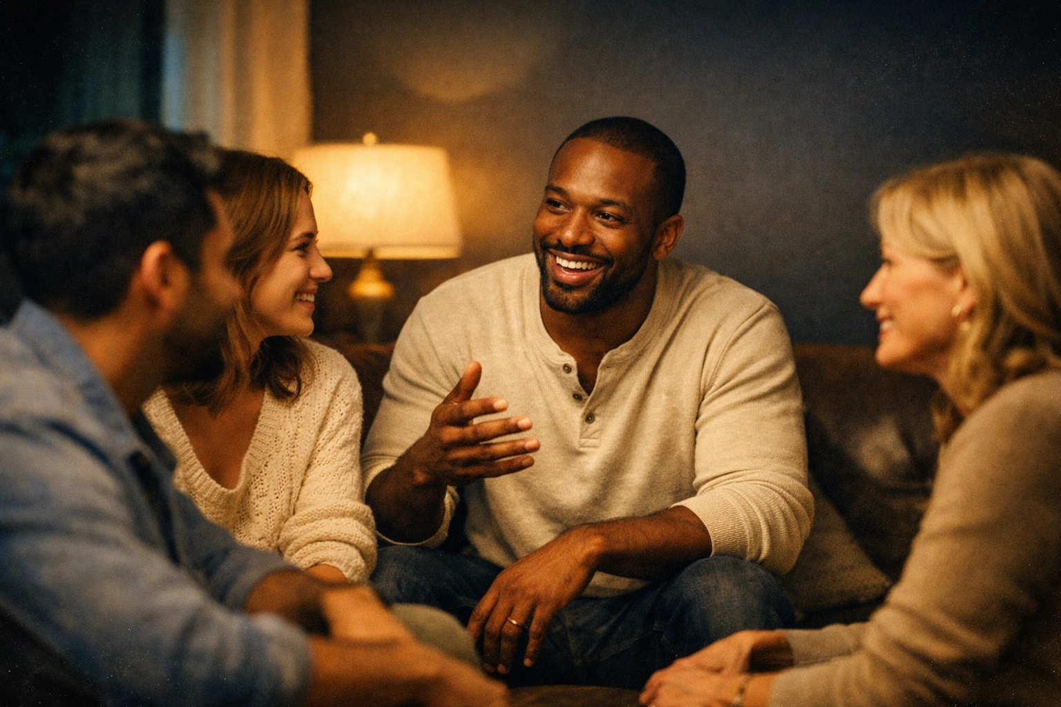 Small group sharing faith testimonies in living room