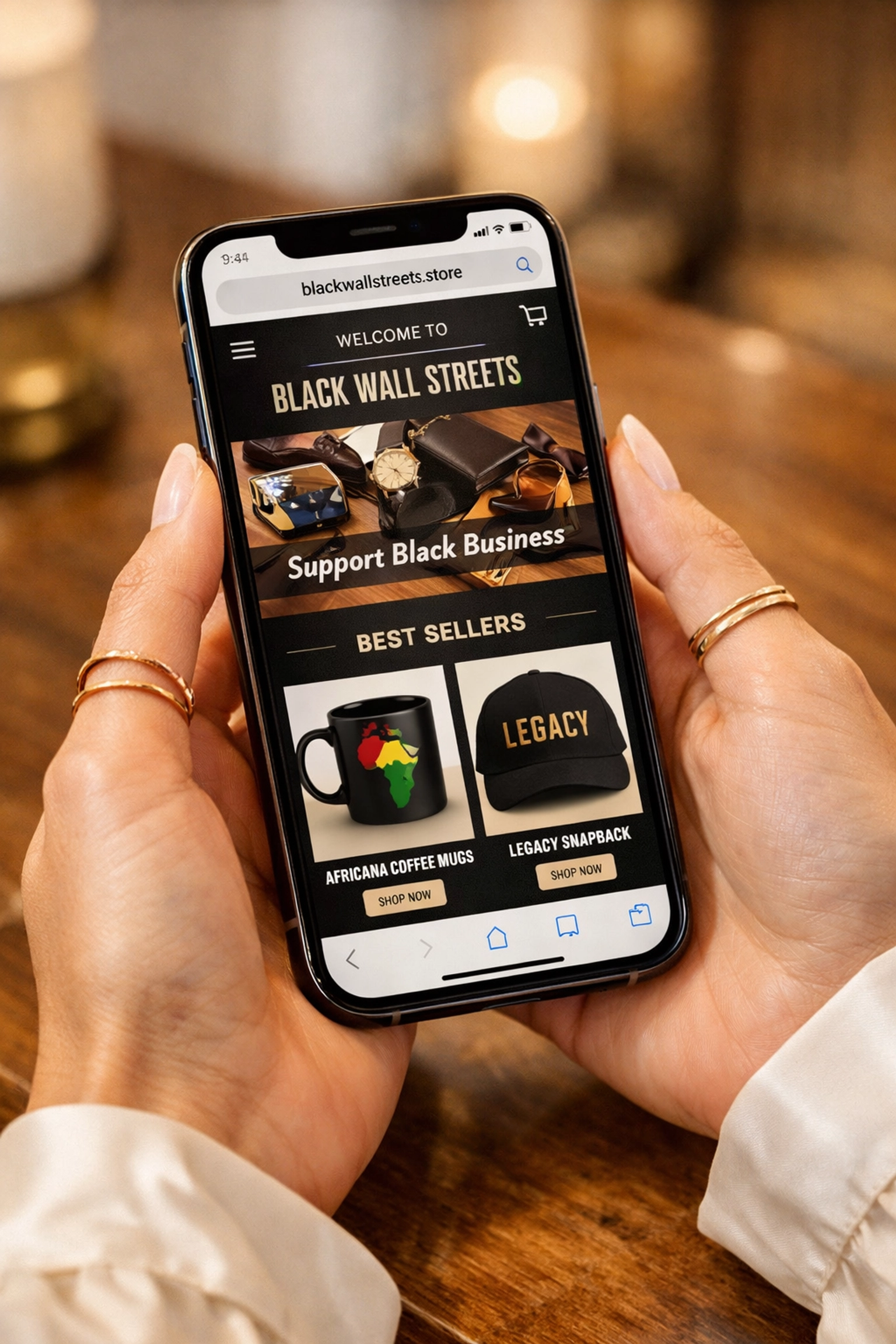 Person shopping on the Black Wall Streets marketplace website for jewelry using a smartphone.