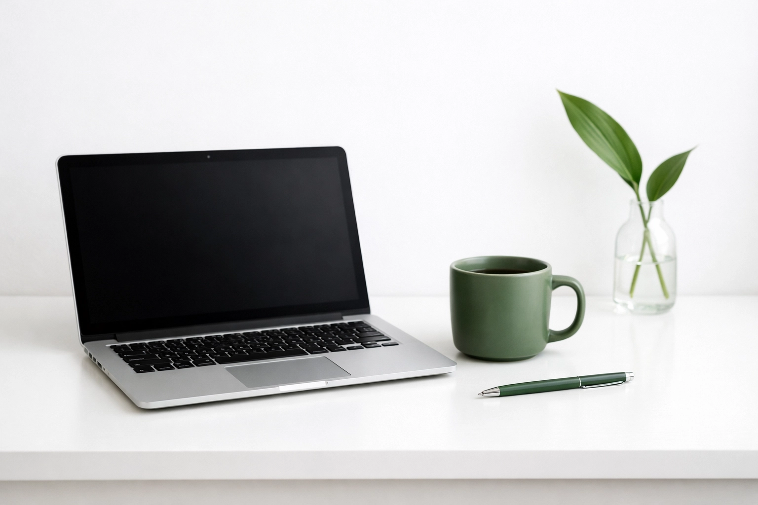 Modern workspace with a laptop used for contractor website maintenance and managing customer leads.