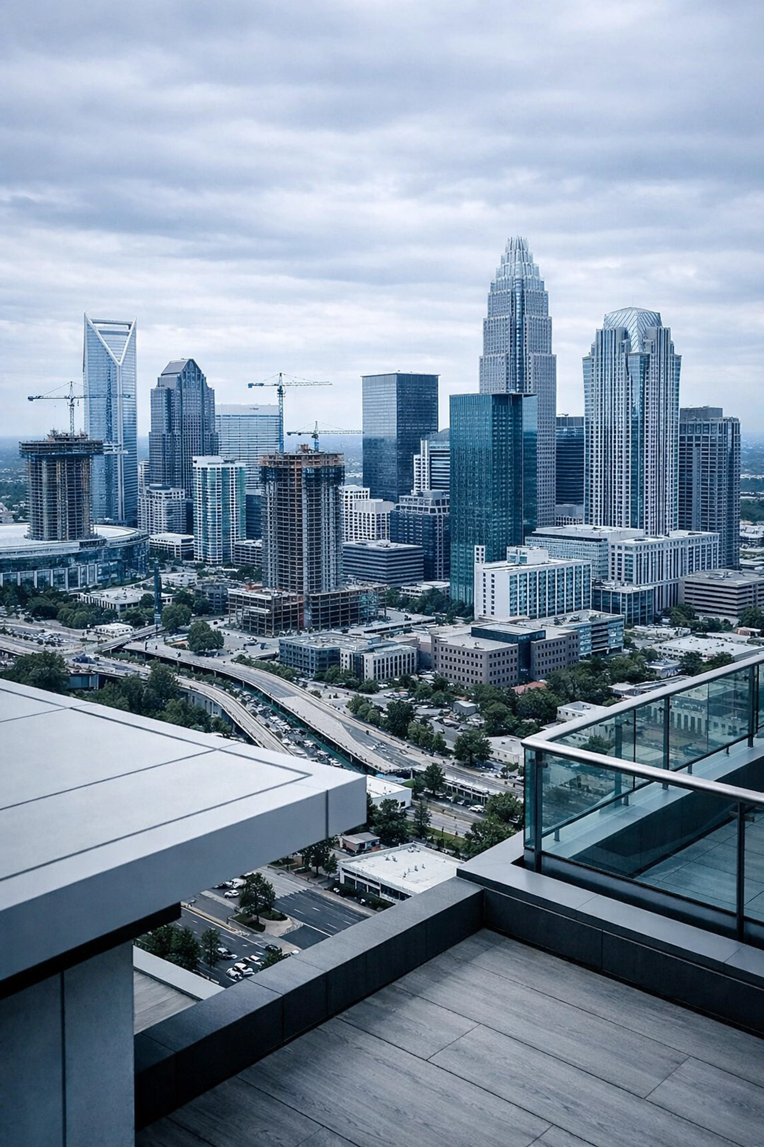 Charlotte NC skyline with construction cranes showing urban growth and HVAC service demand.
