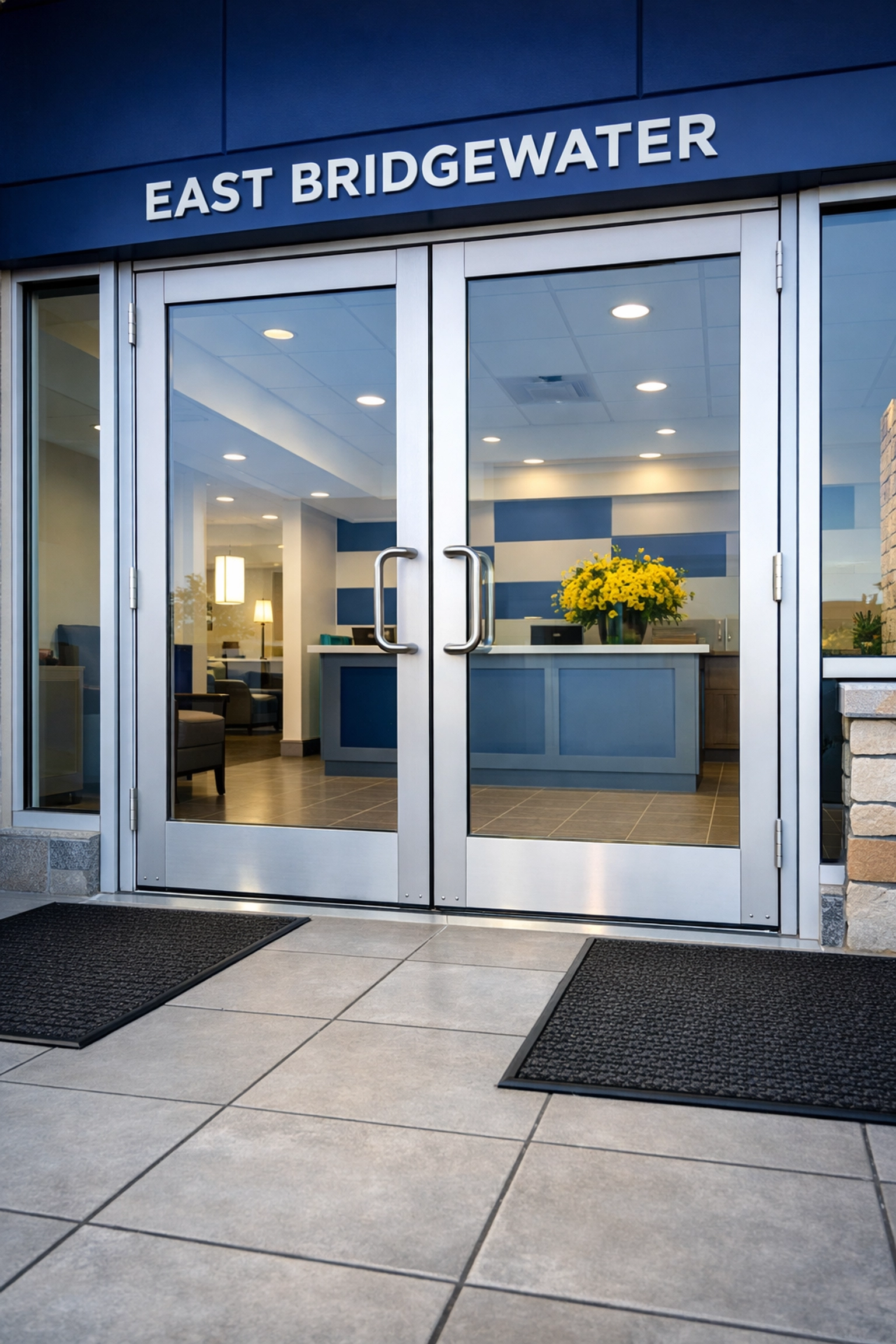 Impeccable commercial building entrance maintenance and glass cleaning services in East Bridgewater.