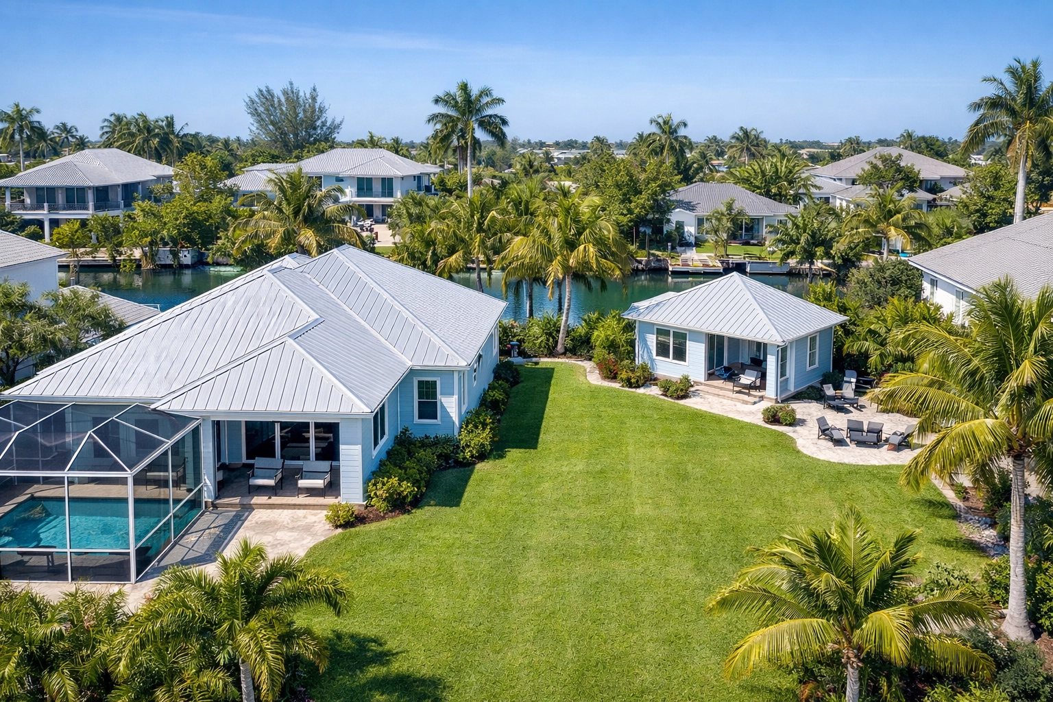 Aerial view of Lee County home with matching ADU structure in backyard showing cohesive design