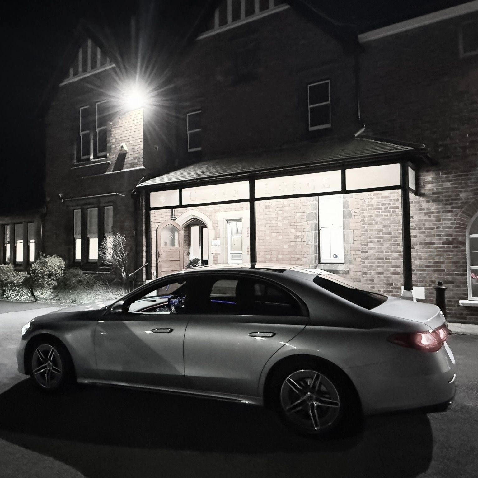 Aura Journeys Mercedes-Benz at night