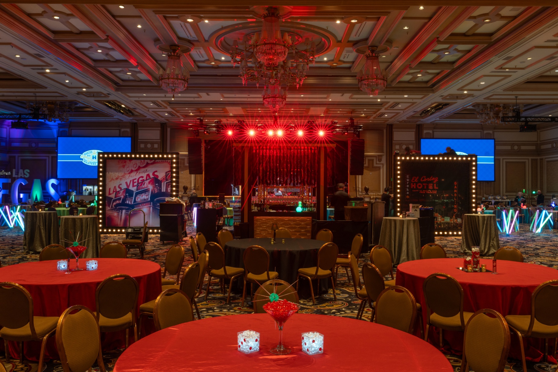 Vibrant Vegas ballroom setup—clean lighting, bold color, and a production-ready look