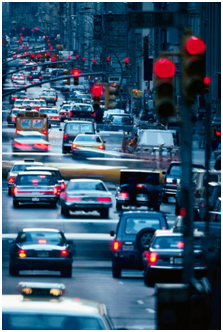 Heavy city traffic with multiple vehicles at red lights