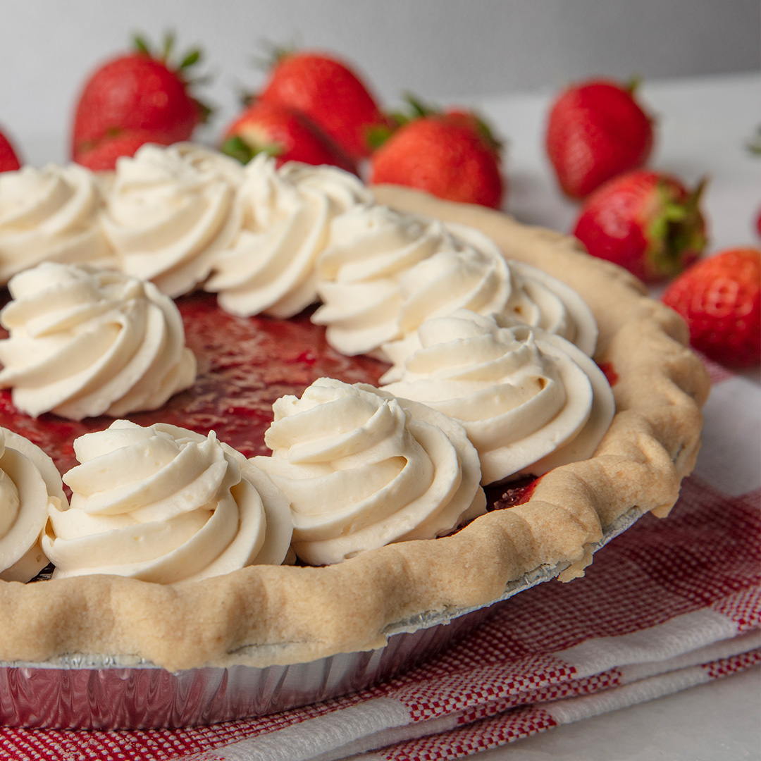 Strawberry pie on red gingham
