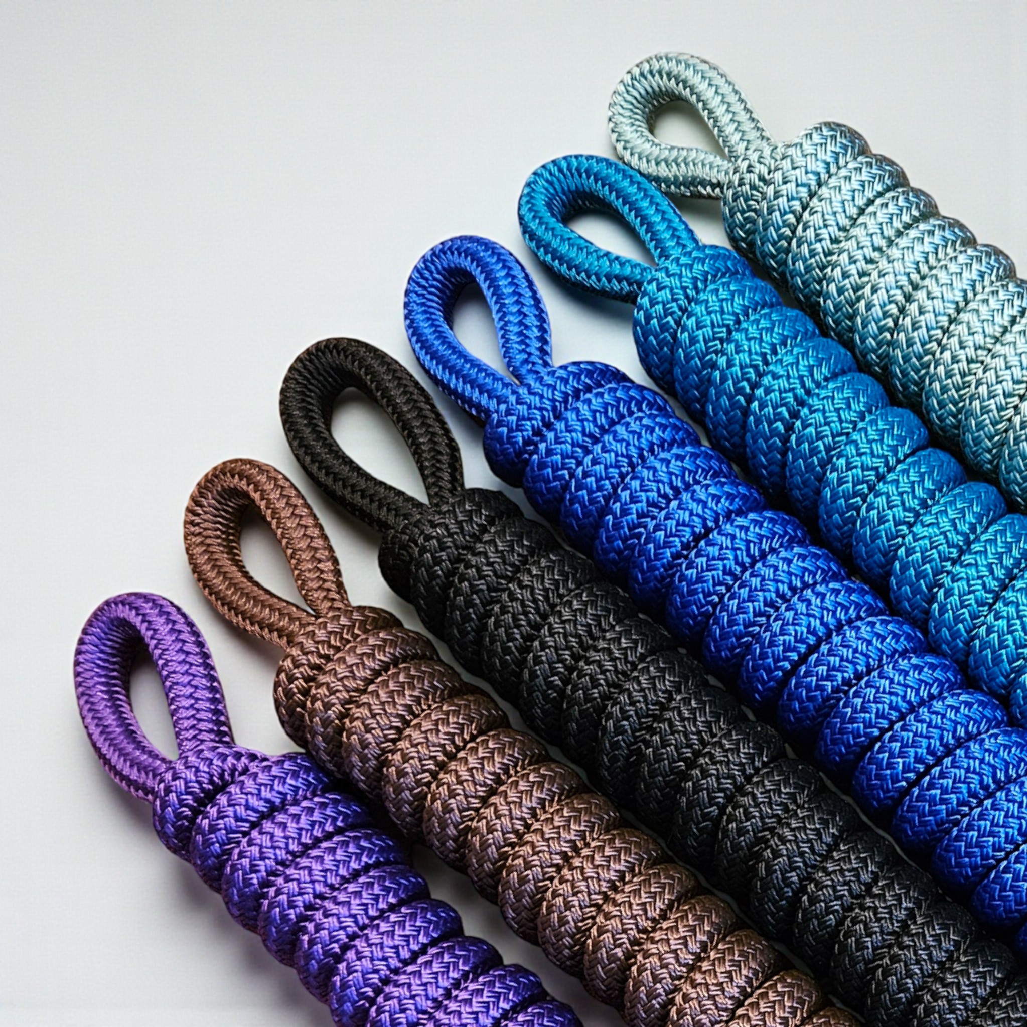 A variety of colourful, handcrafted premium rope leads and groundwork ropes from Ponies &amp; Pups.