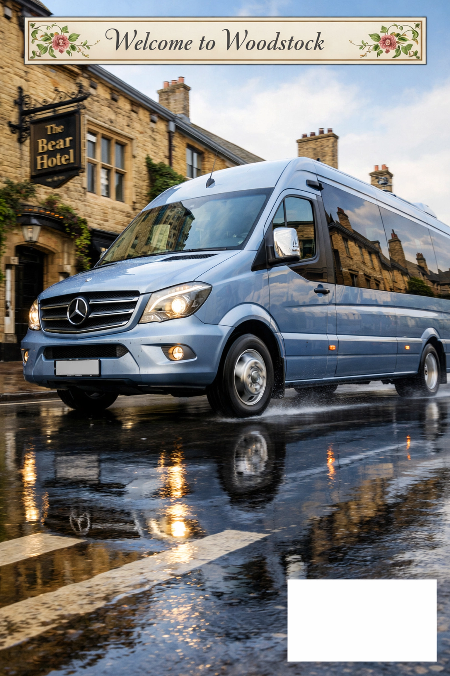 A Silver Blue minibus driving past the historic Bear Hotel in the heart of Woodstock.