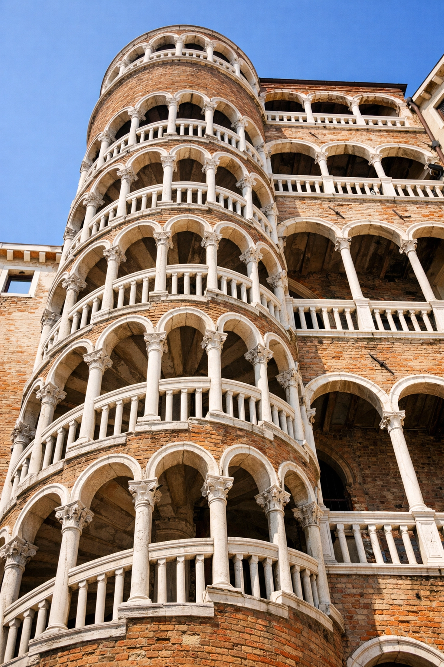 Architectural view of Scala Contarini del Bovolo, a unique choice among the best photography locations in Venice.