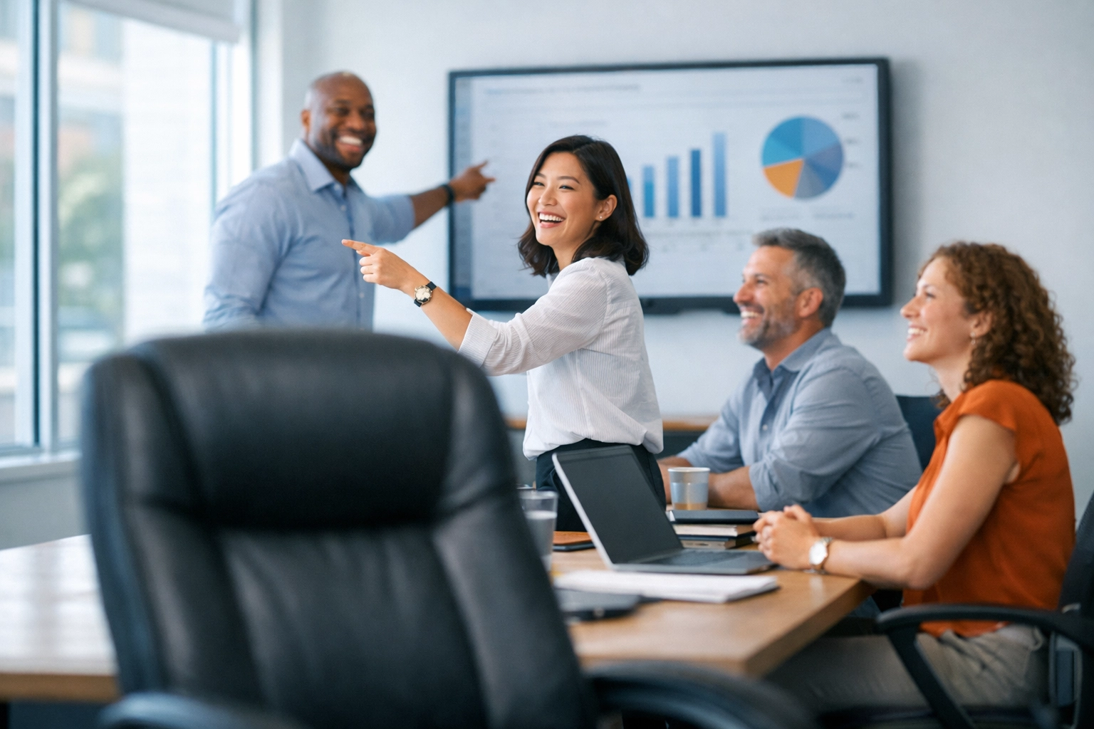 Empty leadership chair while empowered team leads their own meeting autonomously