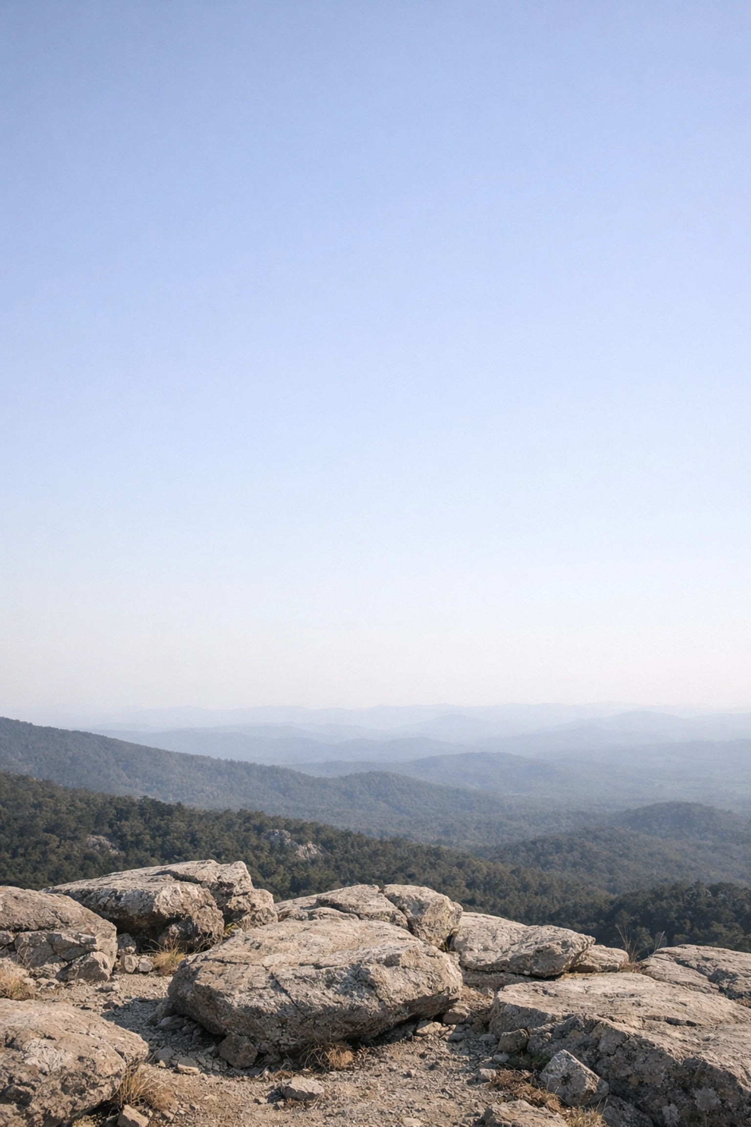 A landscape composition showing a large empty sky and low horizon line, illustrating a common photography mistake.