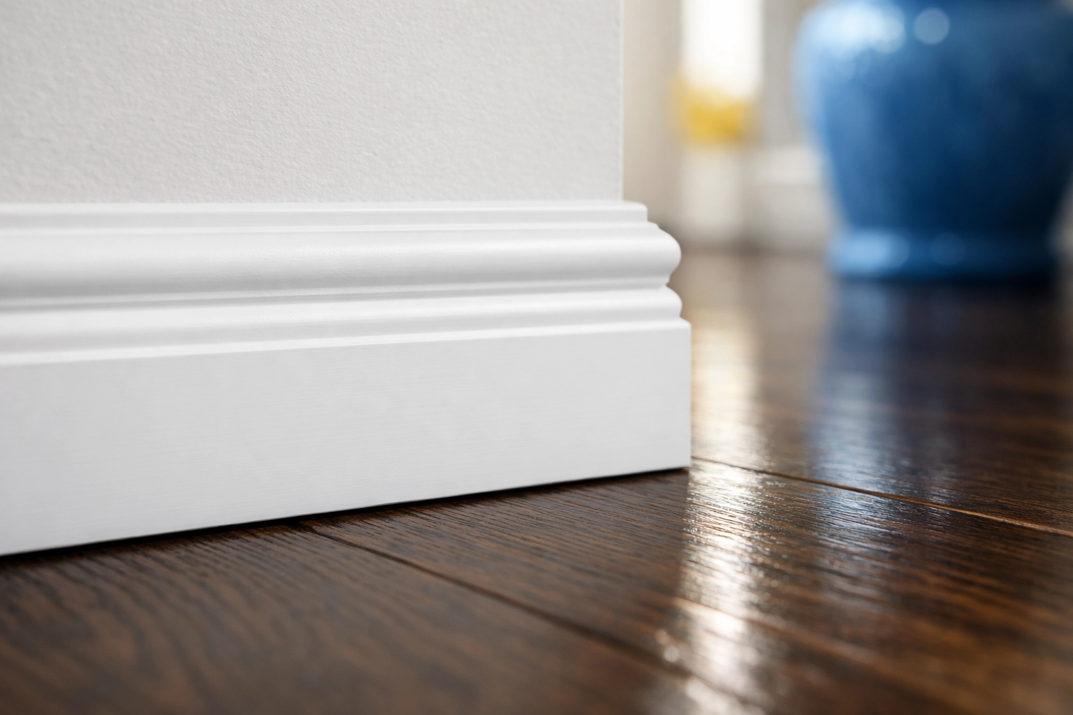 Meticulously scrubbed white baseboards and polished floors after a professional deep cleaning Marlborough session.