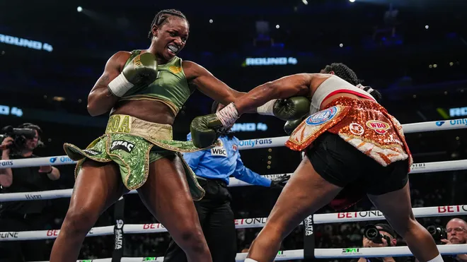 Claressa Shields and Franchon Crews-Dezurn facing off under the bright Little Caesars Arena lights in Detroit