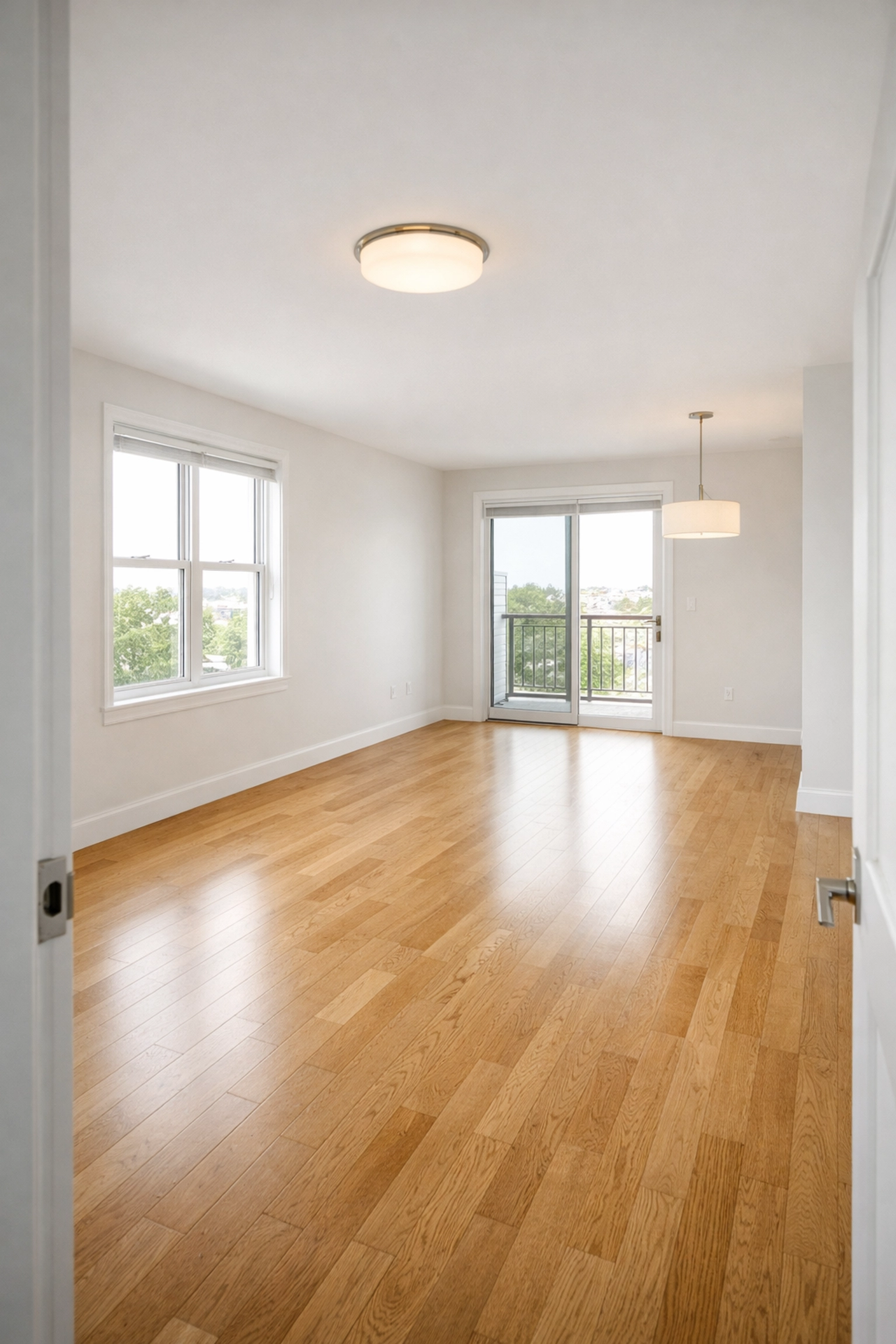 Move-in ready apartment with clean floors and bright windows after turnover completion