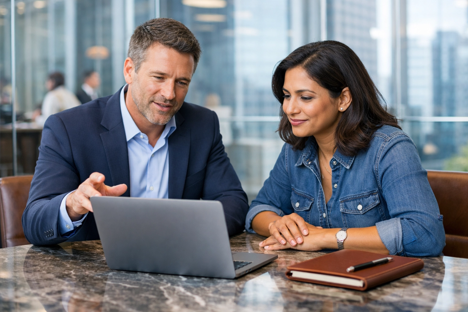 Small business owner discussing 2026 IRS tax changes and credits with a professional consultant.