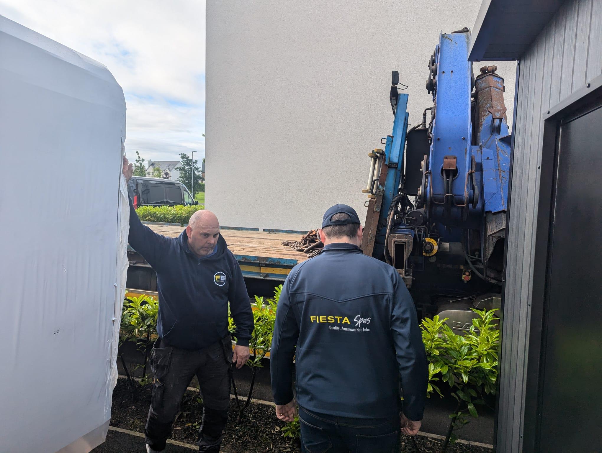 fiesta-spas-team-installing-hot-tub-crane.jpg