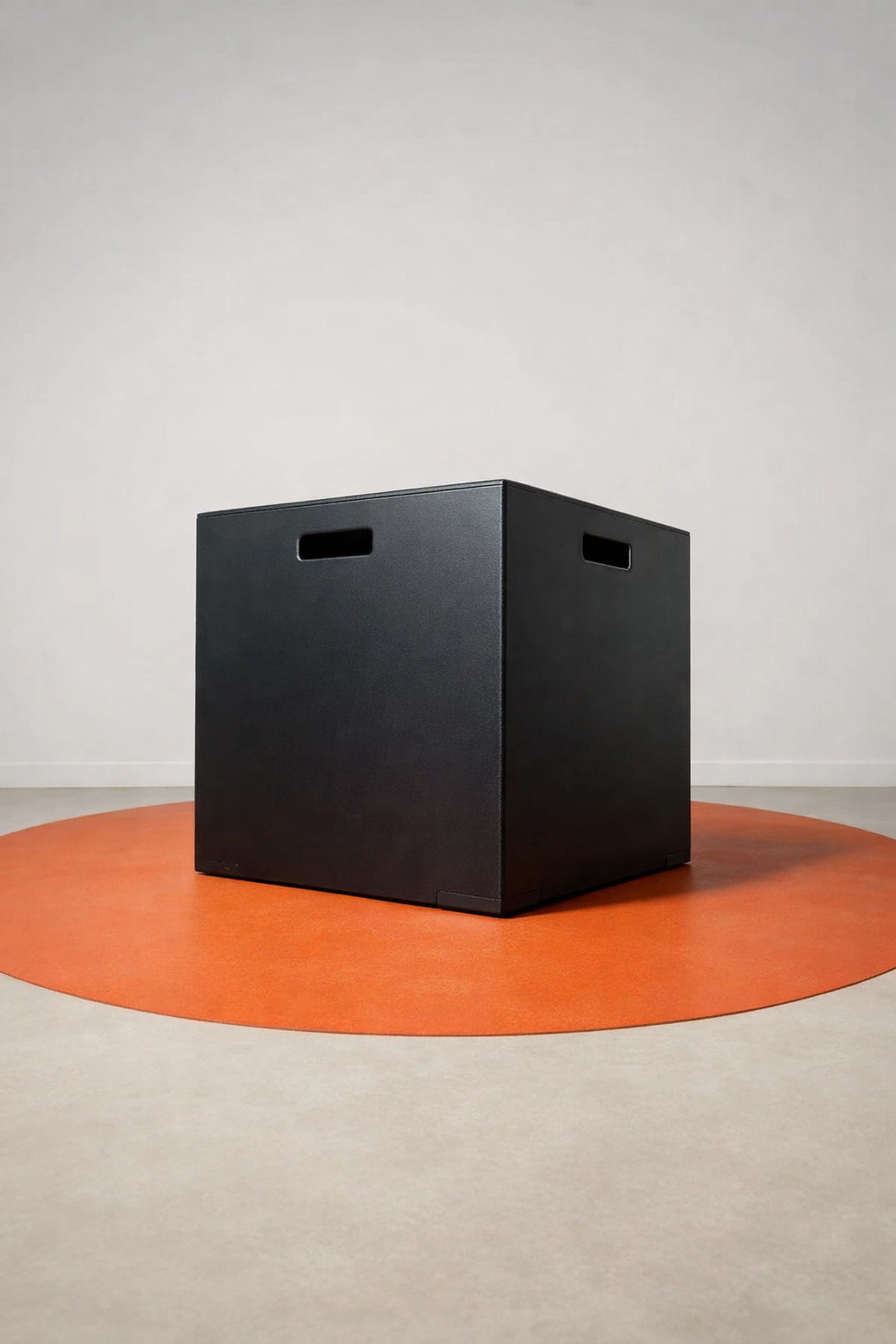 A professional matte black plyometric box used for box jumps and explosive power training.