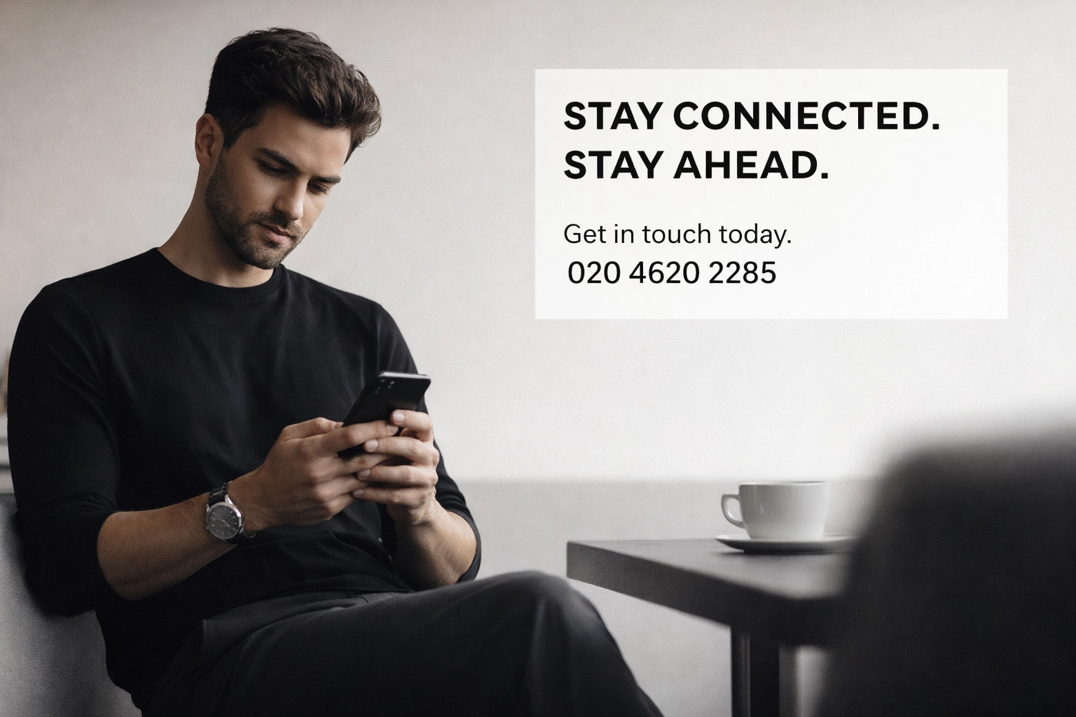 Minimal lifestyle scene featuring a person on their phone with clean, premium editorial styling.