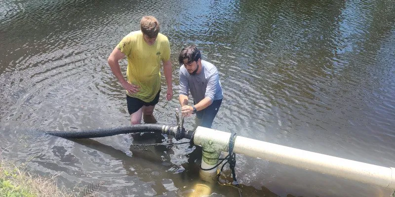 Professional technicians inspecting water systems