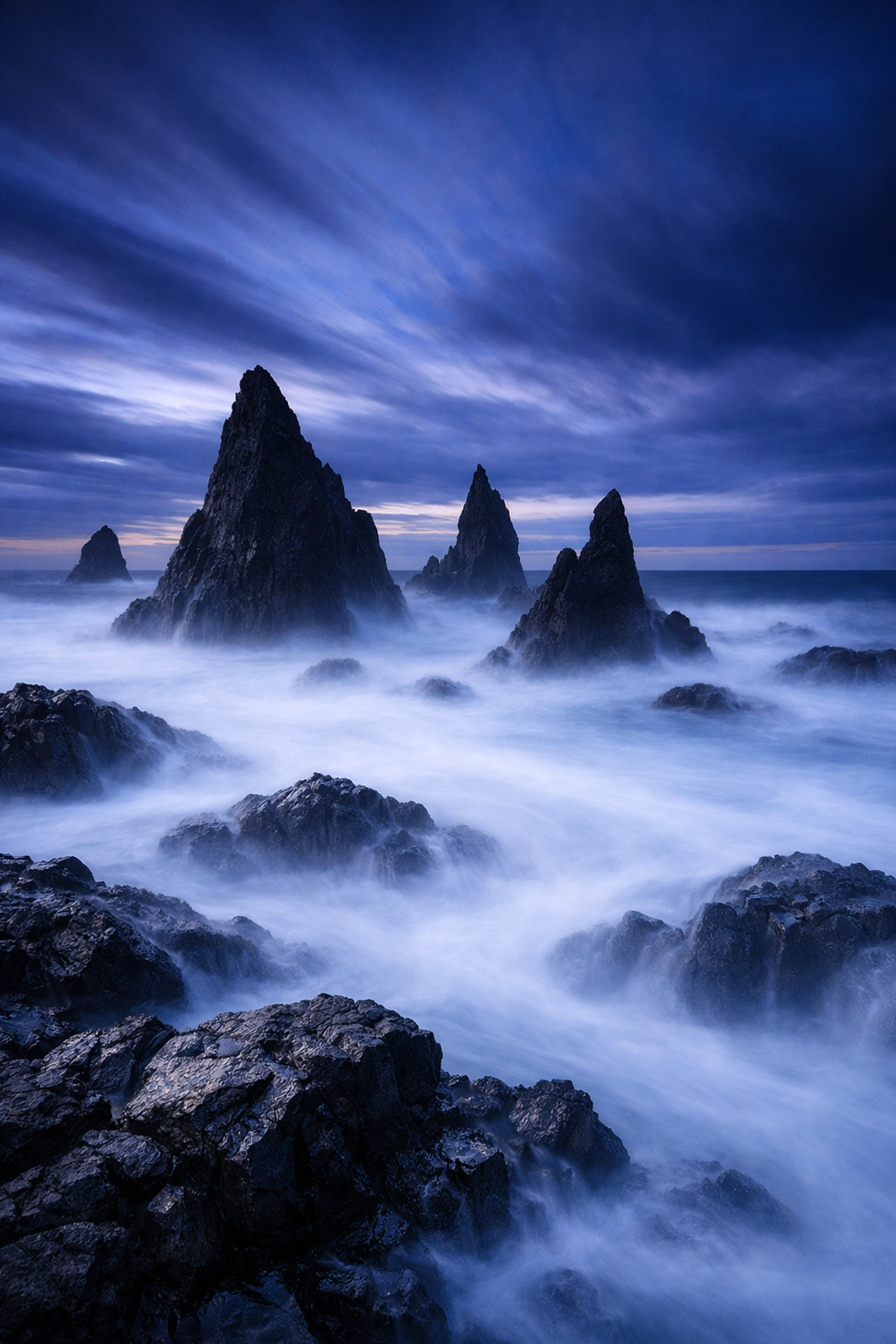 Long exposure landscape photography showing misty water for the ultimate guide to landscape photography.