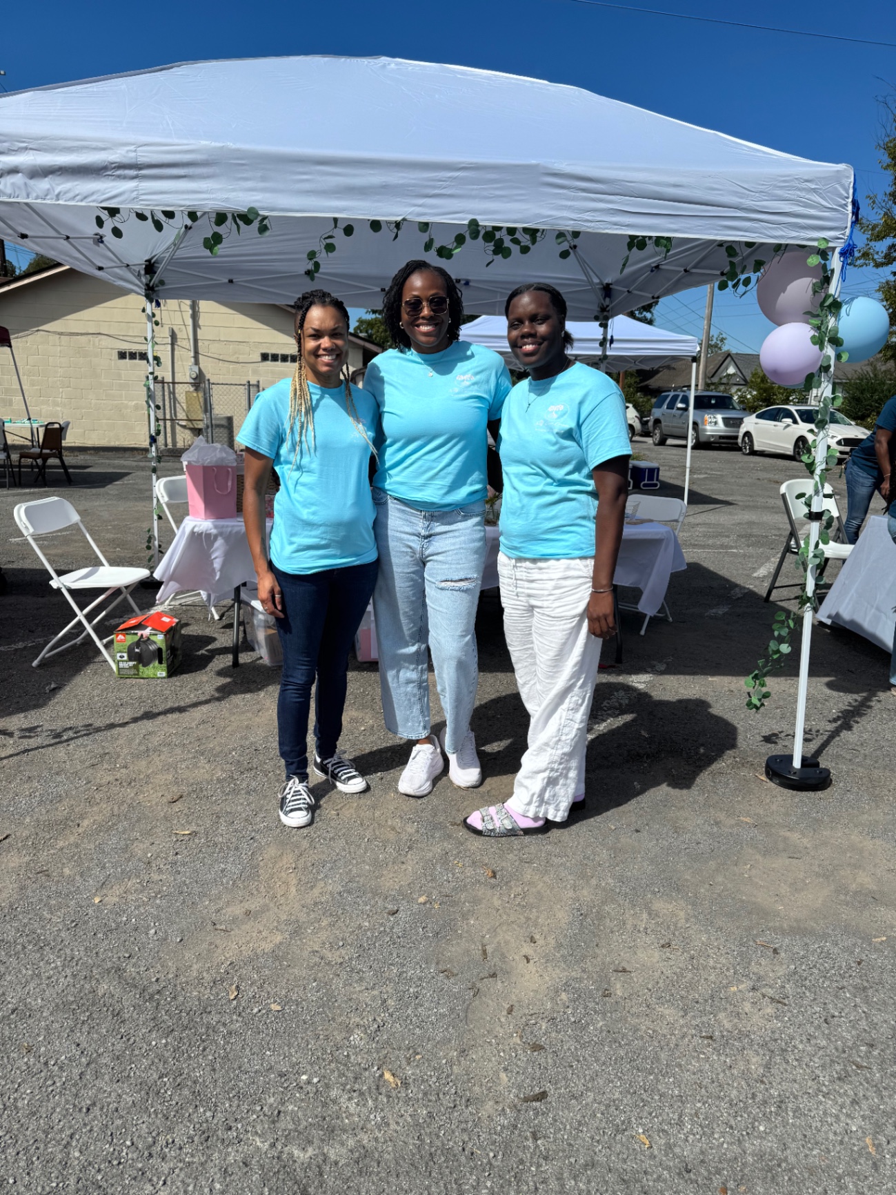 Team under a canopy—together, grounded, and supported—bringing a personal touch to the healing journey.