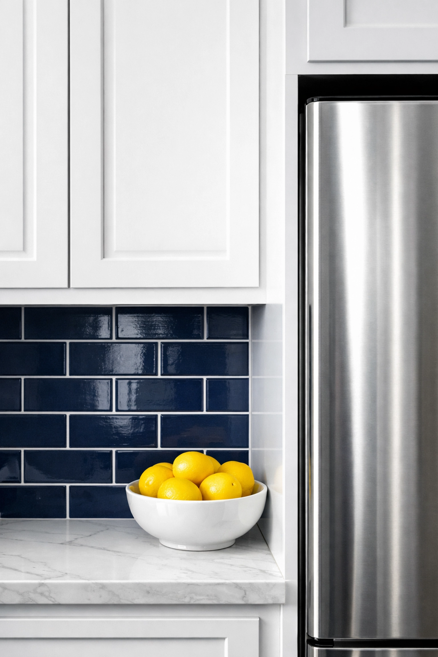 Spotless modern Boston kitchen with clean white cabinets and polished surfaces to avoid move-out cleaning pitfalls.