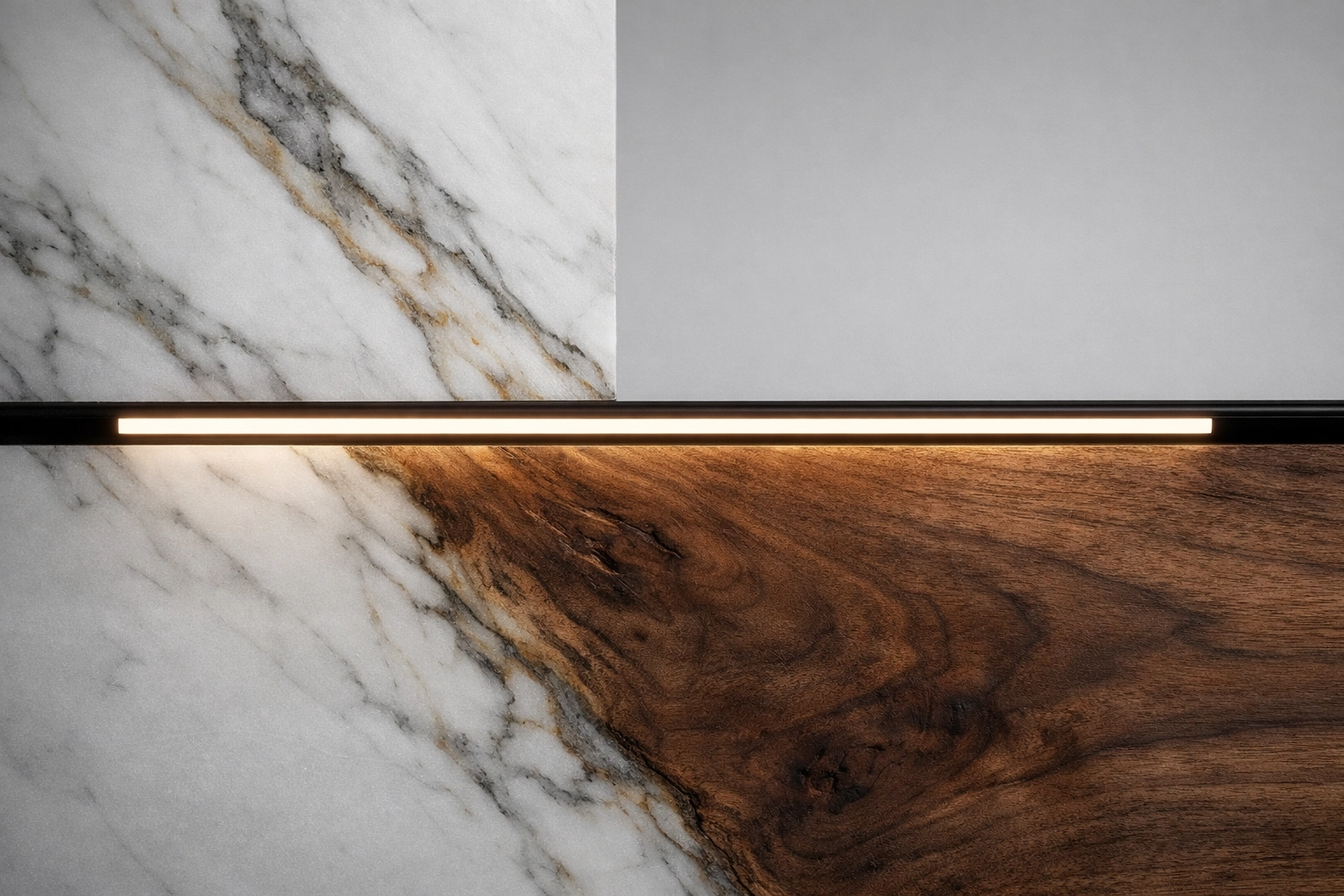 Linear LED lighting illuminating marble and walnut textures with high CRI for accurate color rendering.