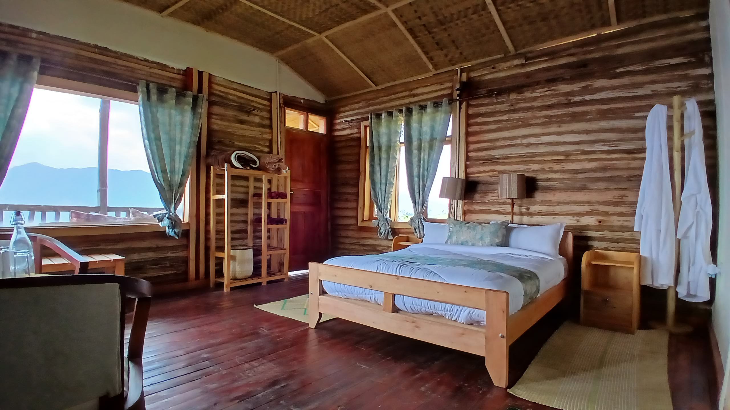 Spacious eco-luxury guest room at Orugano Bwindi Lodge