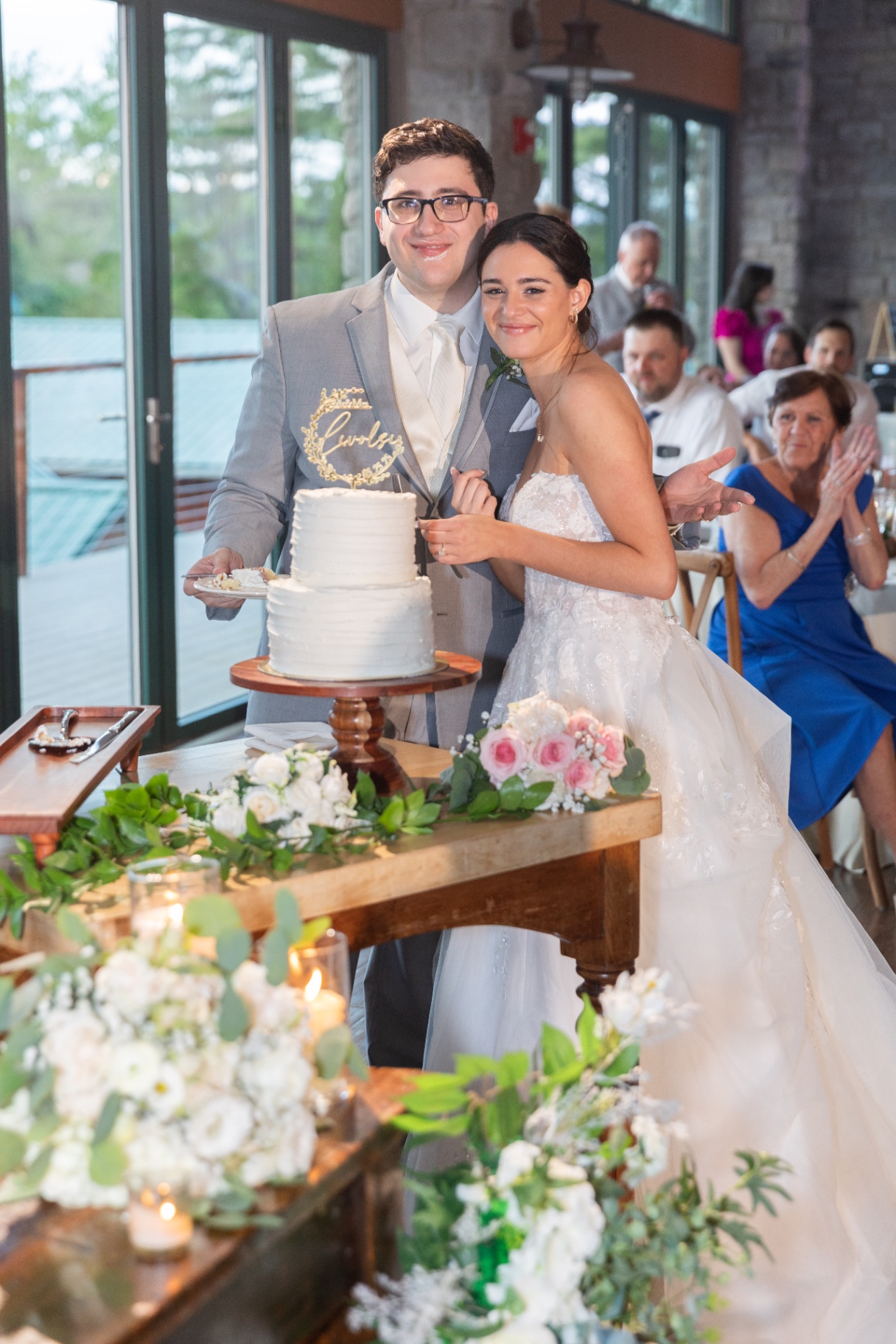 Bride and Groom Cutting Wedding Cake
