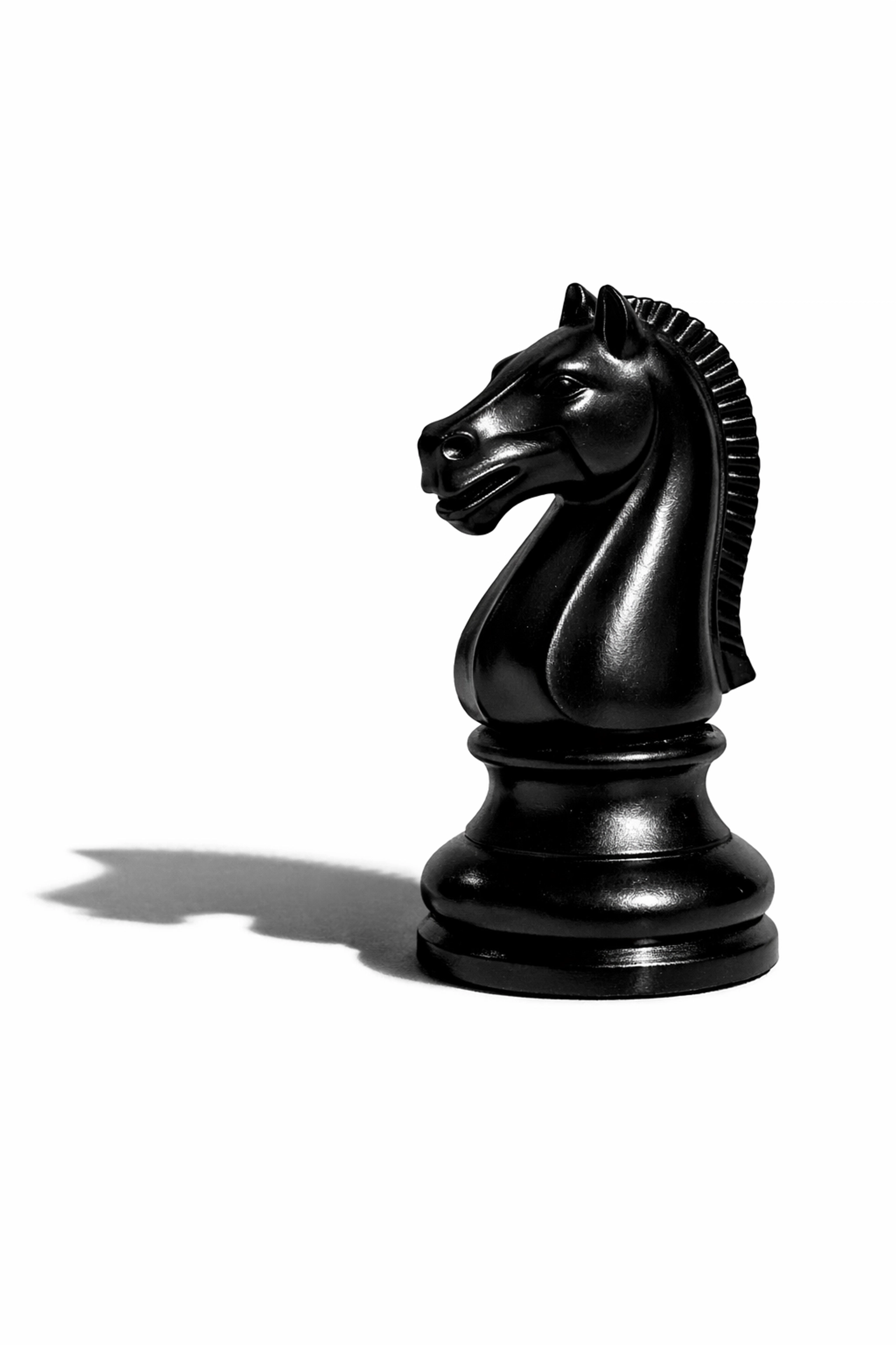 A black knight chess piece representing military strategy and leadership in The Art of War.