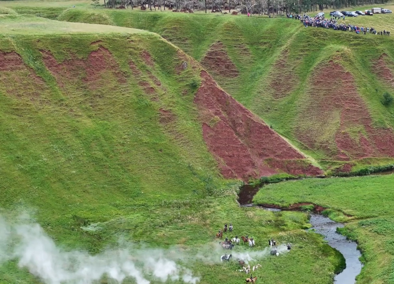 Ceremonial gathering in a valley