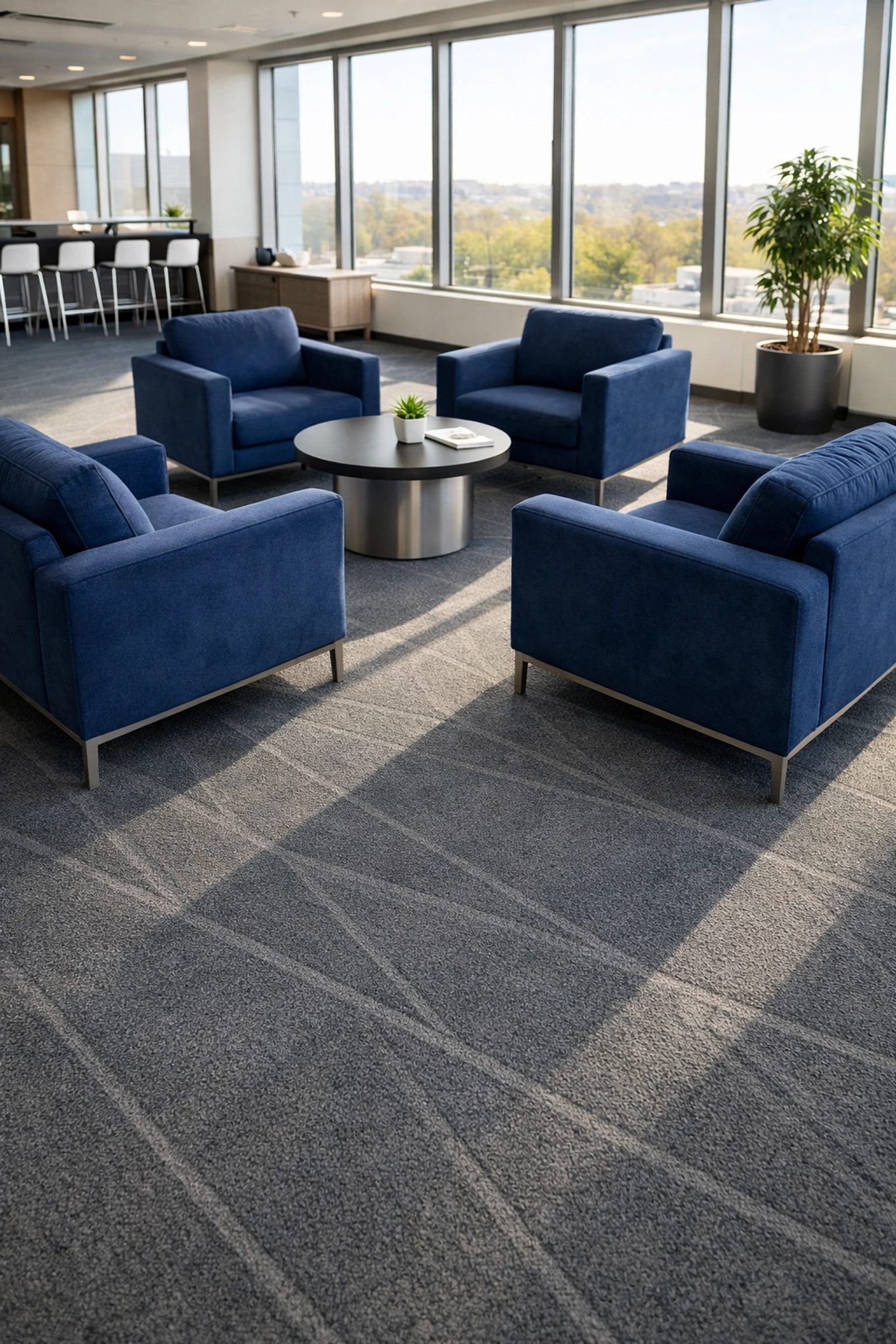 Commercial cleaning services in Westchester County NY featuring a clean office lounge and vacuumed carpet.