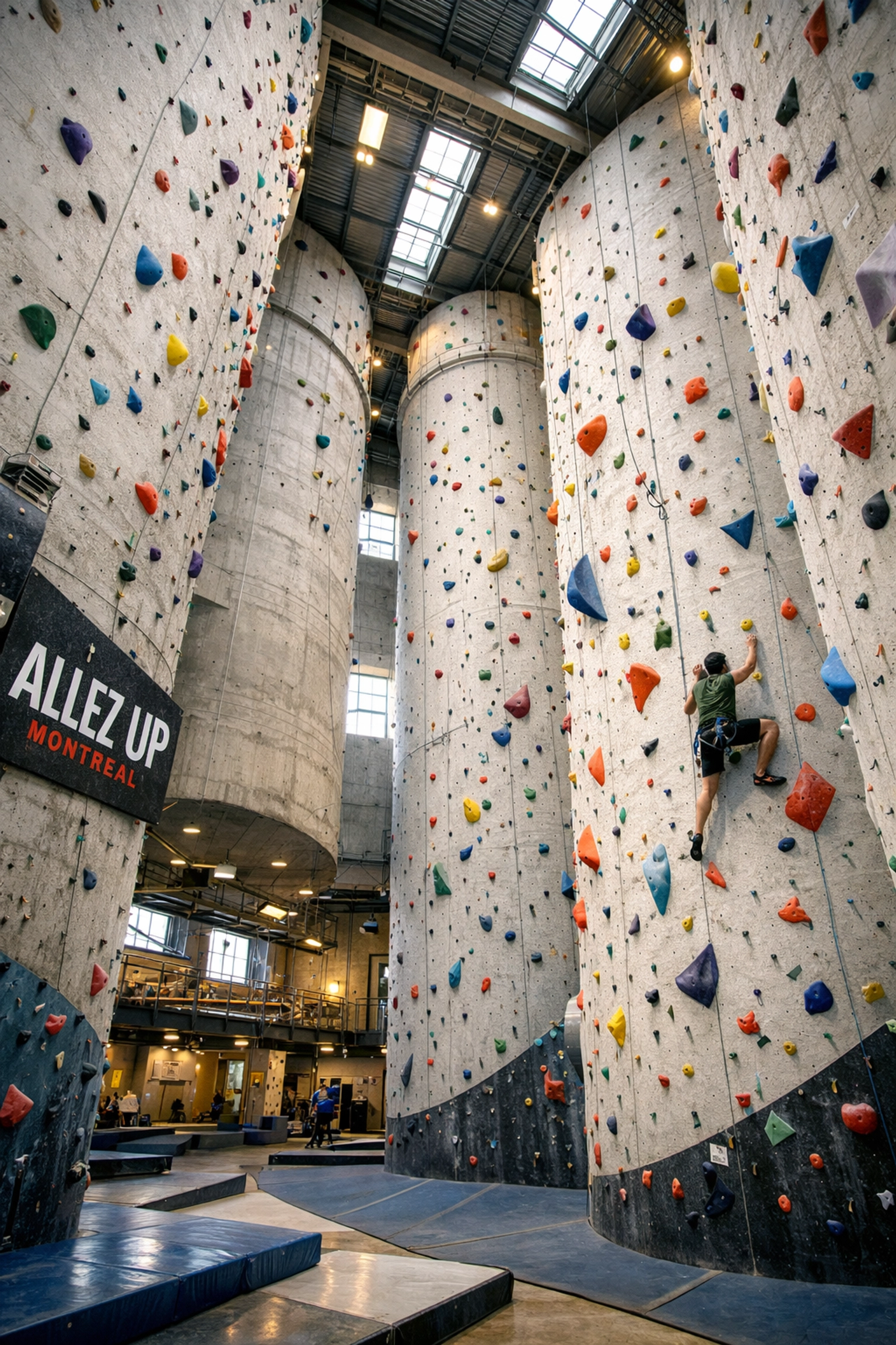 Indoor rock climbing walls at Allez Up gym in Montreal's converted industrial silos.