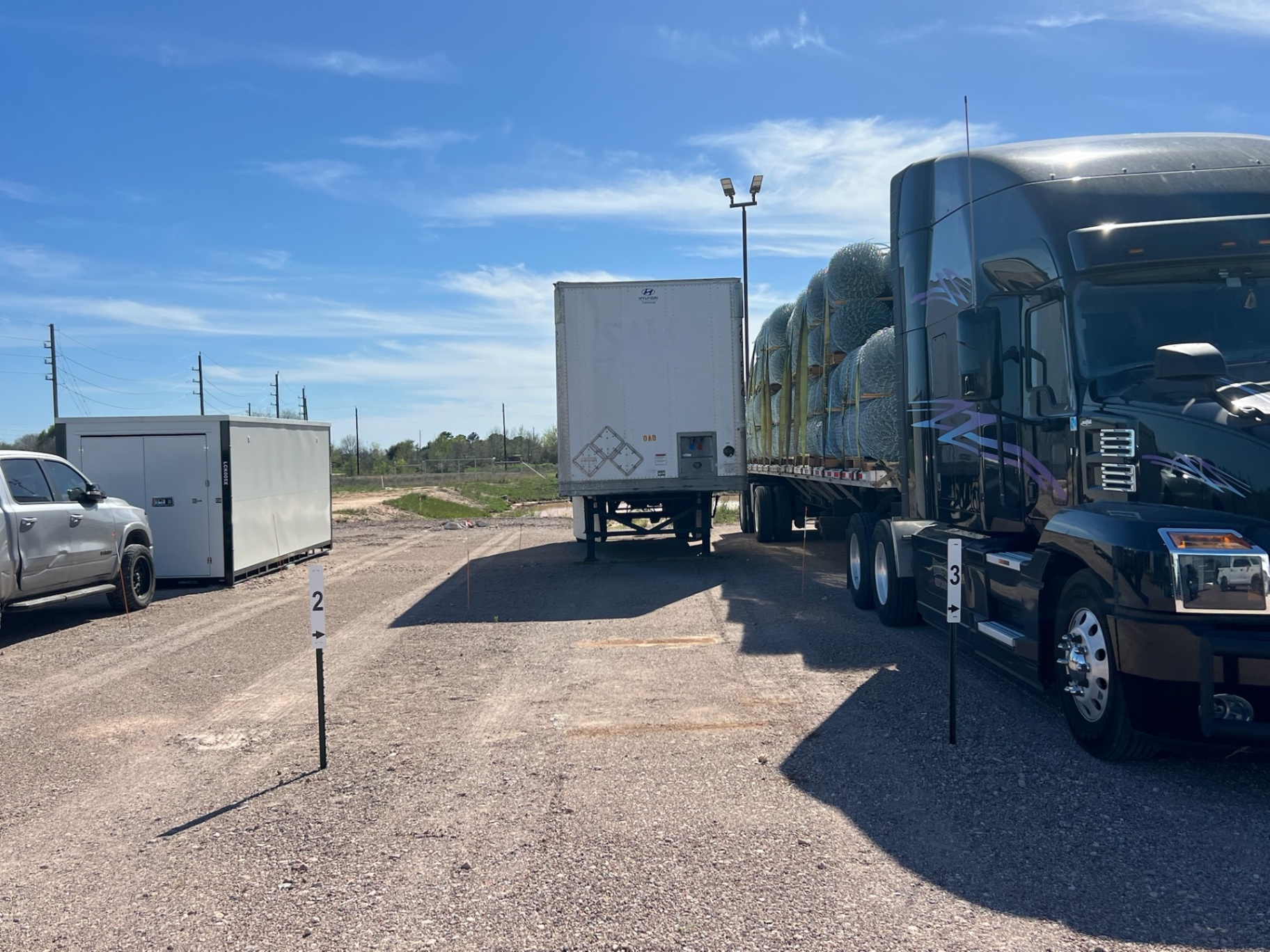 Gravel Truck Parking Lot with Storage Container