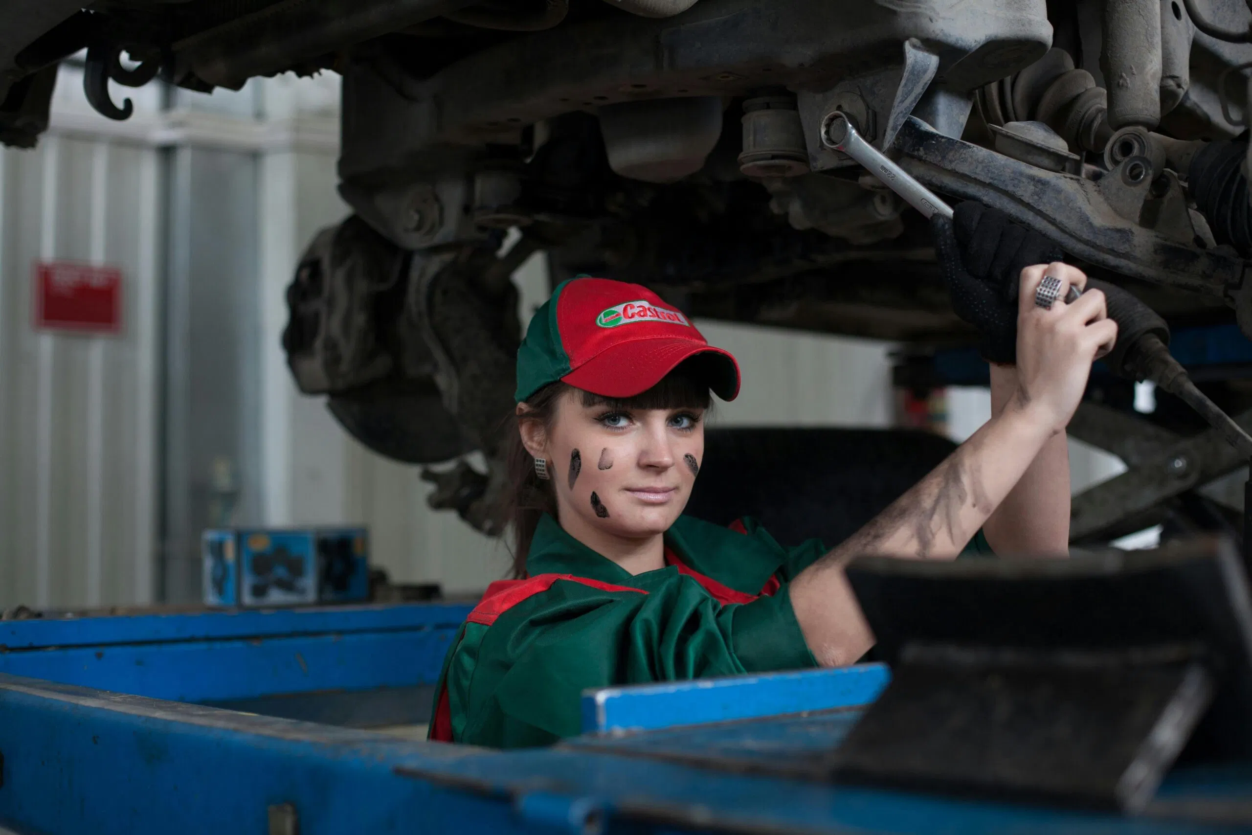 Mobile technician working under a vehicle