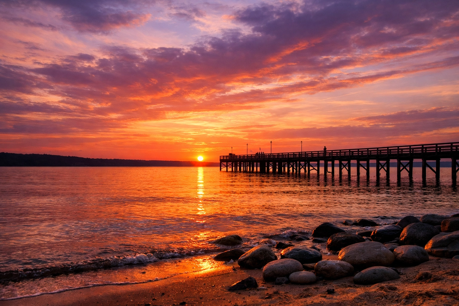 A peaceful sunset over the Potomac River and fishing pier at Leesylvania State Park in Woodbridge.