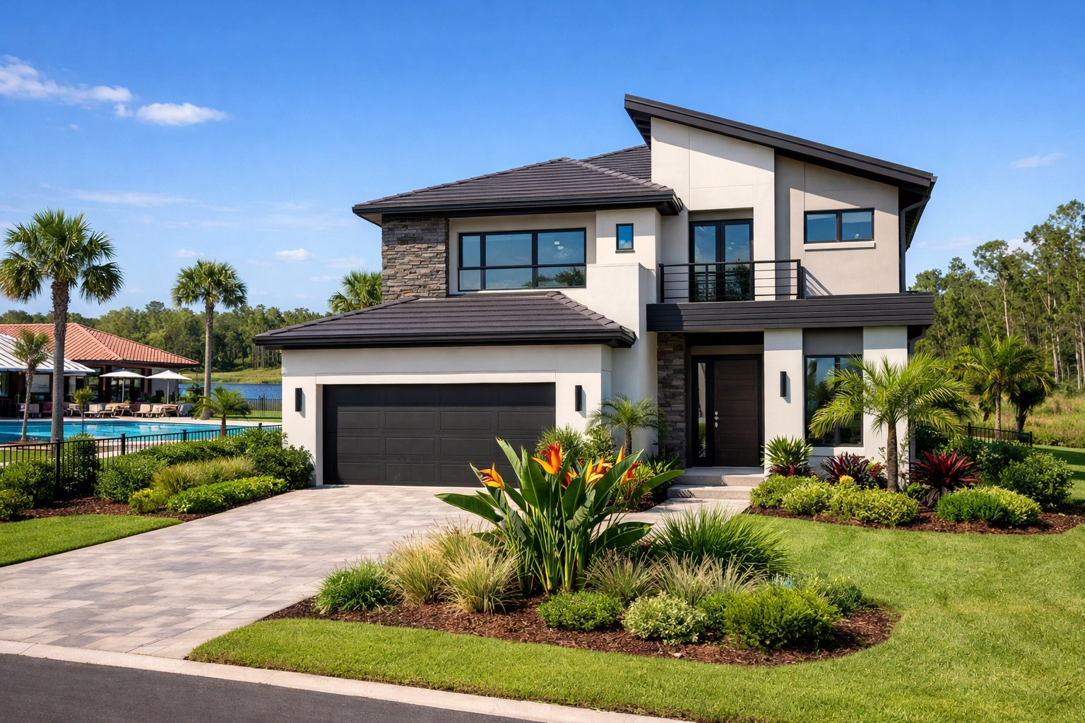 Modern home in Southwest Cape Coral gated community with tropical landscaping