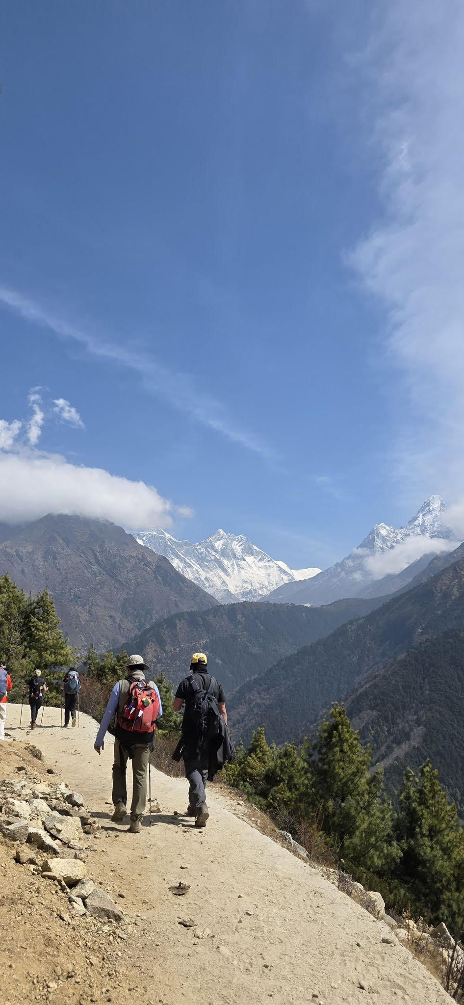 A group of trekkers navigating the rugged Himalayan trails: the exact environment Vivian prepared for