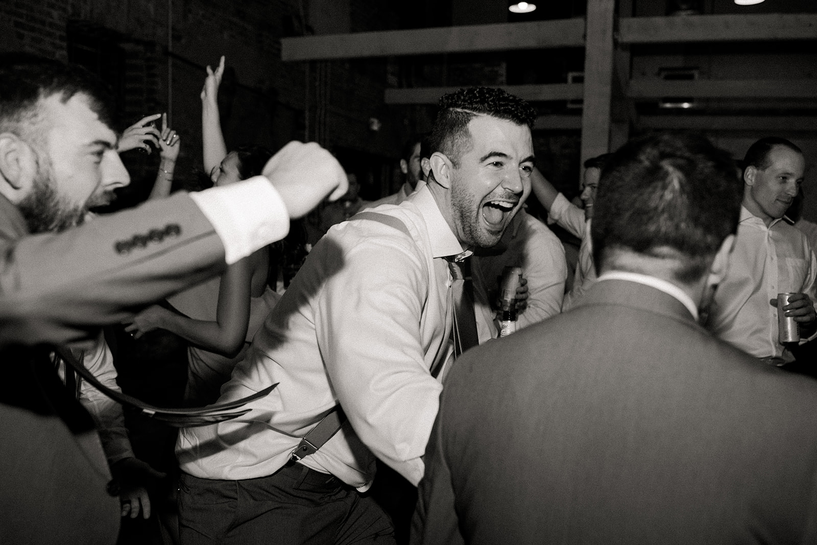 Group of wedding guests celebrating