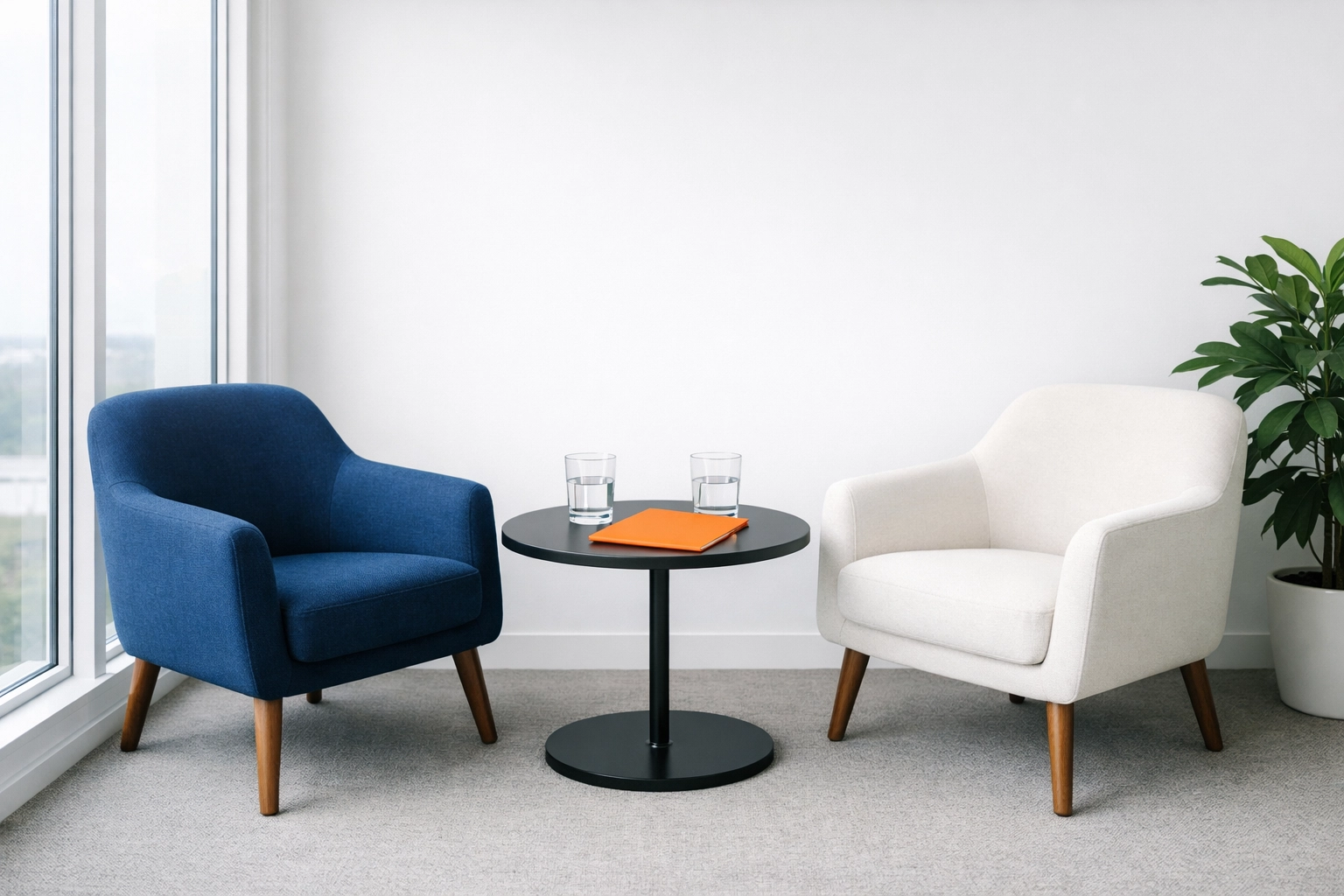 A comfortable meeting area designed for low-pressure sales conversations and genuine business connection.