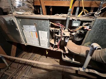 Attic HVAC inspection showing typical Arizona setup and drain lines