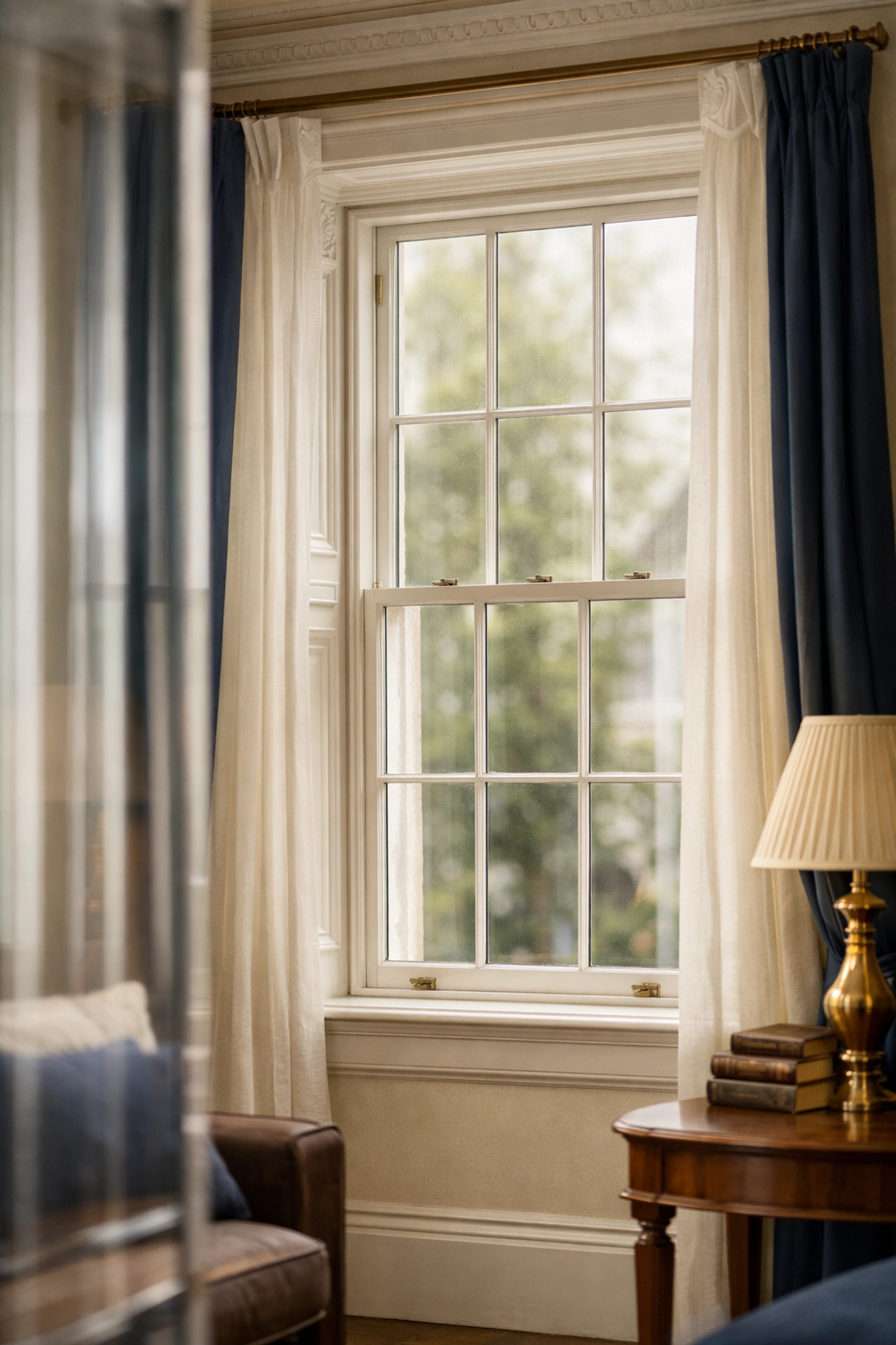 Secondary glazing installed on Victorian sash window in London period home interior